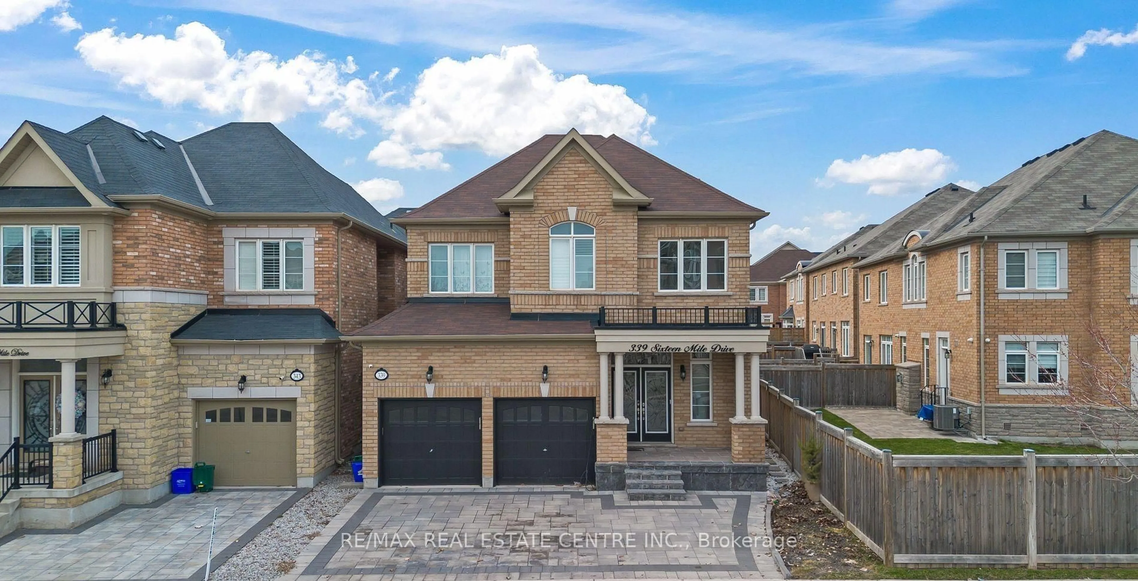 Home with brick exterior material, street for 339 Sixteen Mile Dr, Oakville Ontario L6M 4M2