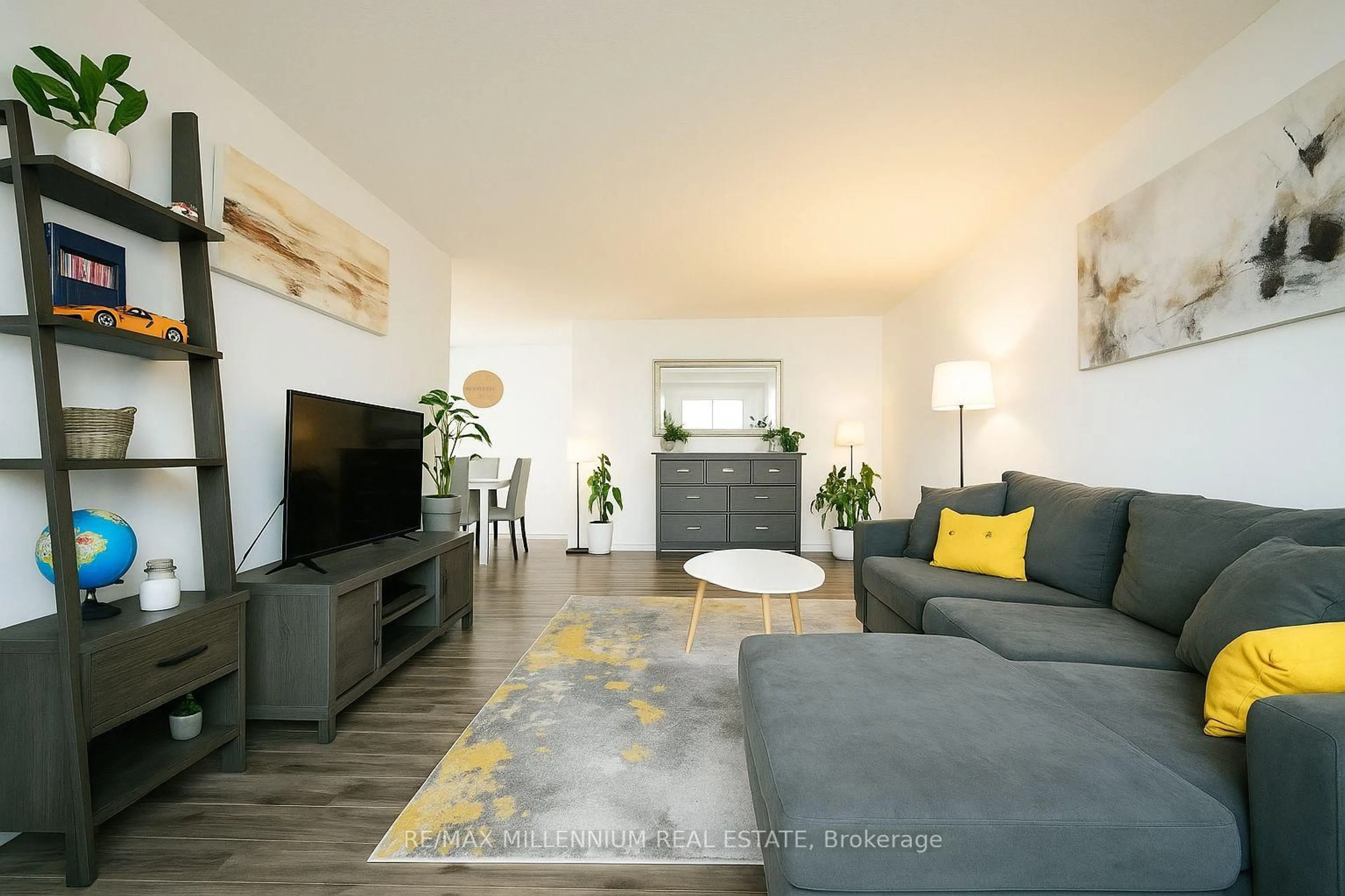 Living room with furniture, wood/laminate floor for 1425 Ghent Ave #902, Burlington Ontario L7S 1X5