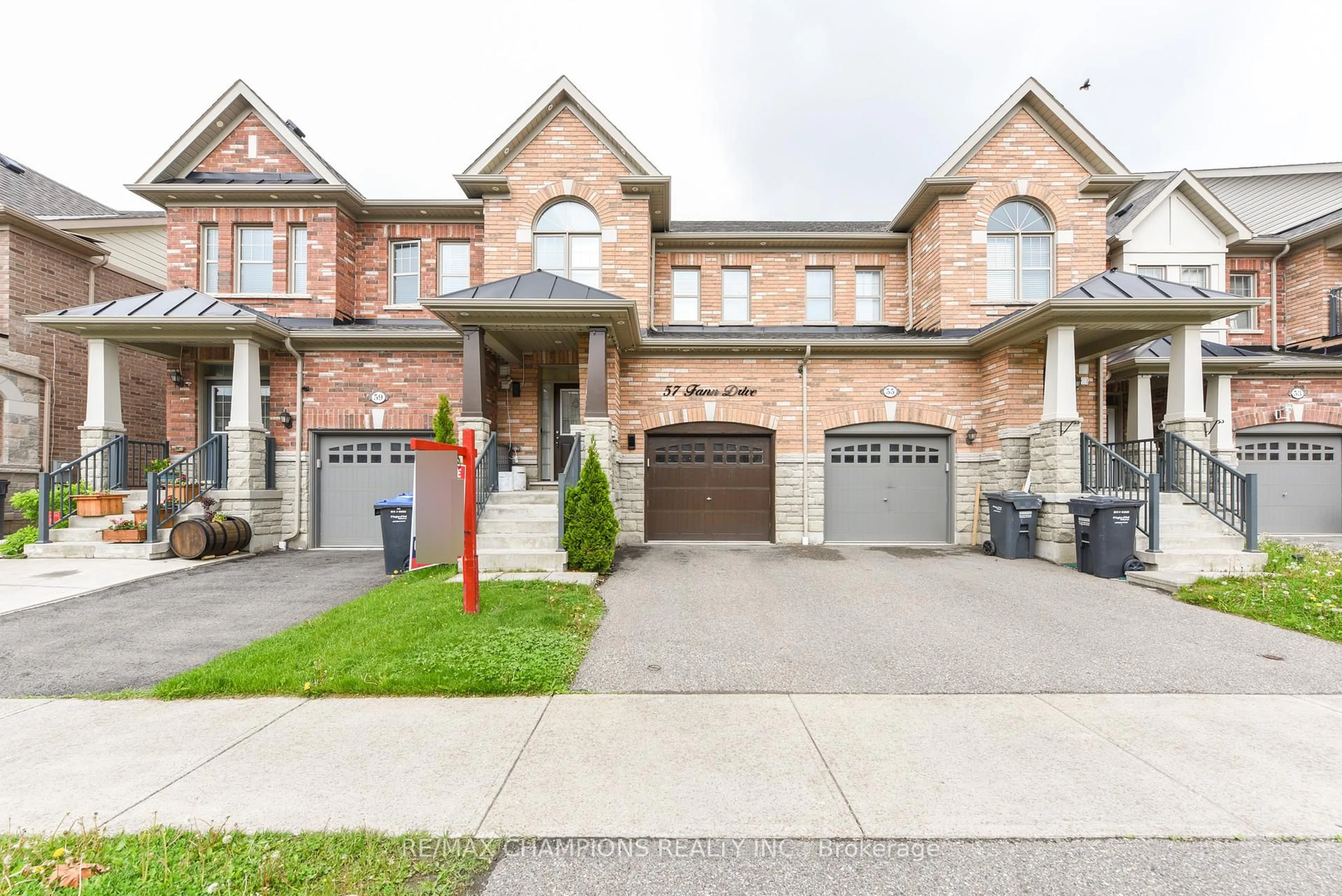 Home with brick exterior material, street for 57 Fann Dr, Brampton Ontario L7A 4L3