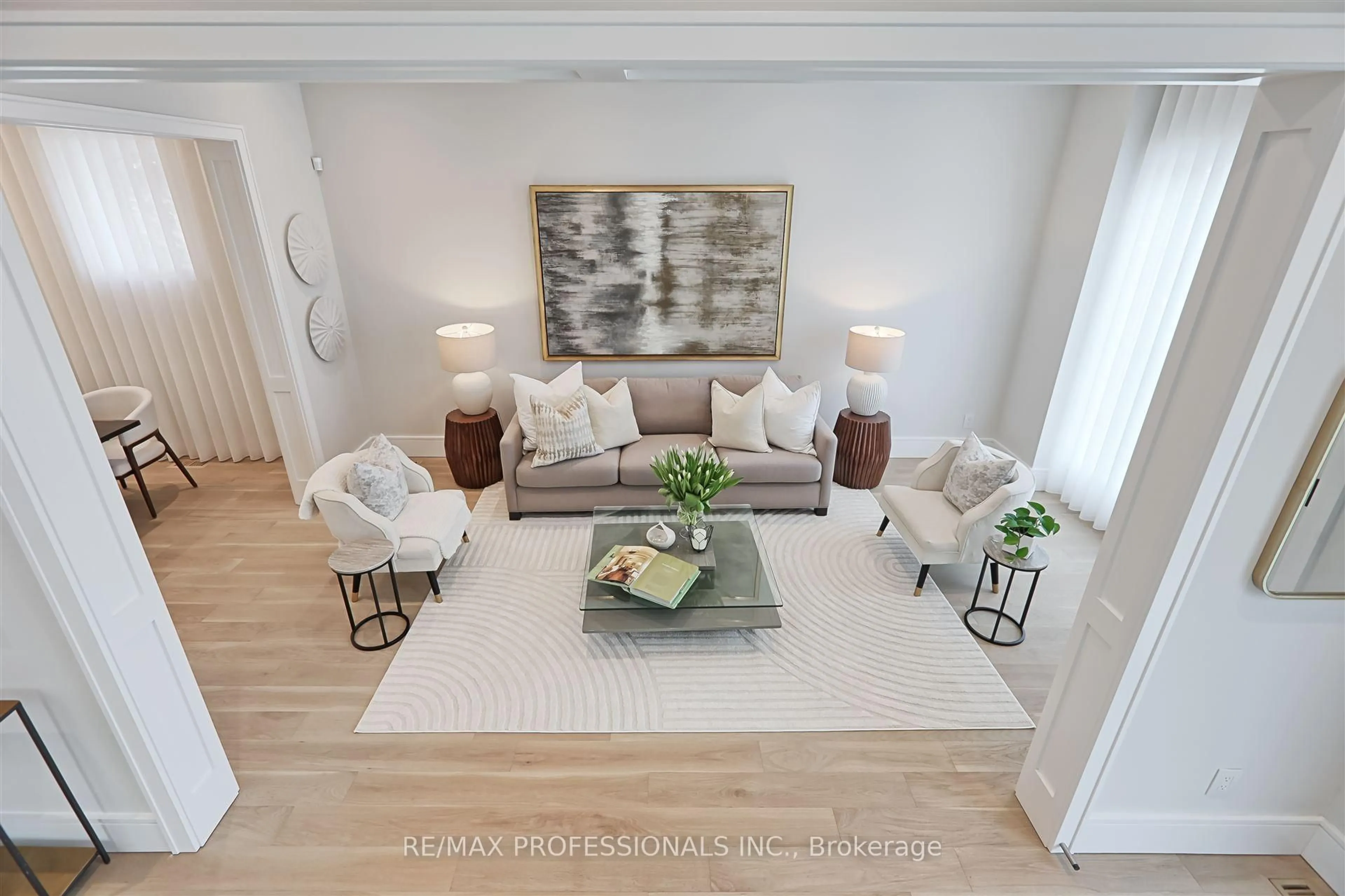 Living room with furniture, wood/laminate floor for 466 Prince Edward Dr, Toronto Ontario M8X 2M3