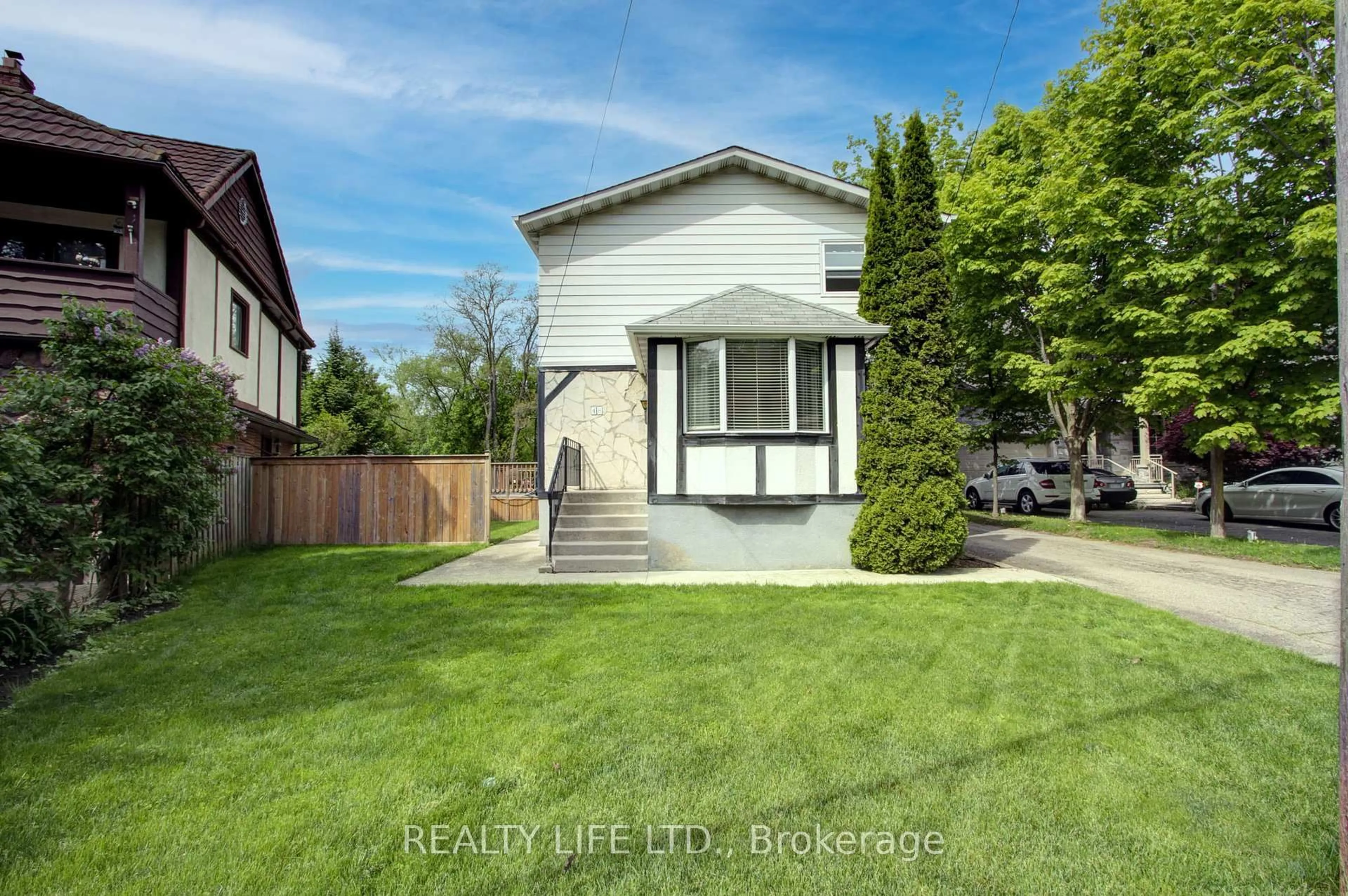 A pic from outside/outdoor area/front of a property/back of a property/a pic from drone, street for 48 Bonnyview Dr, Toronto Ontario M8Y 3G6