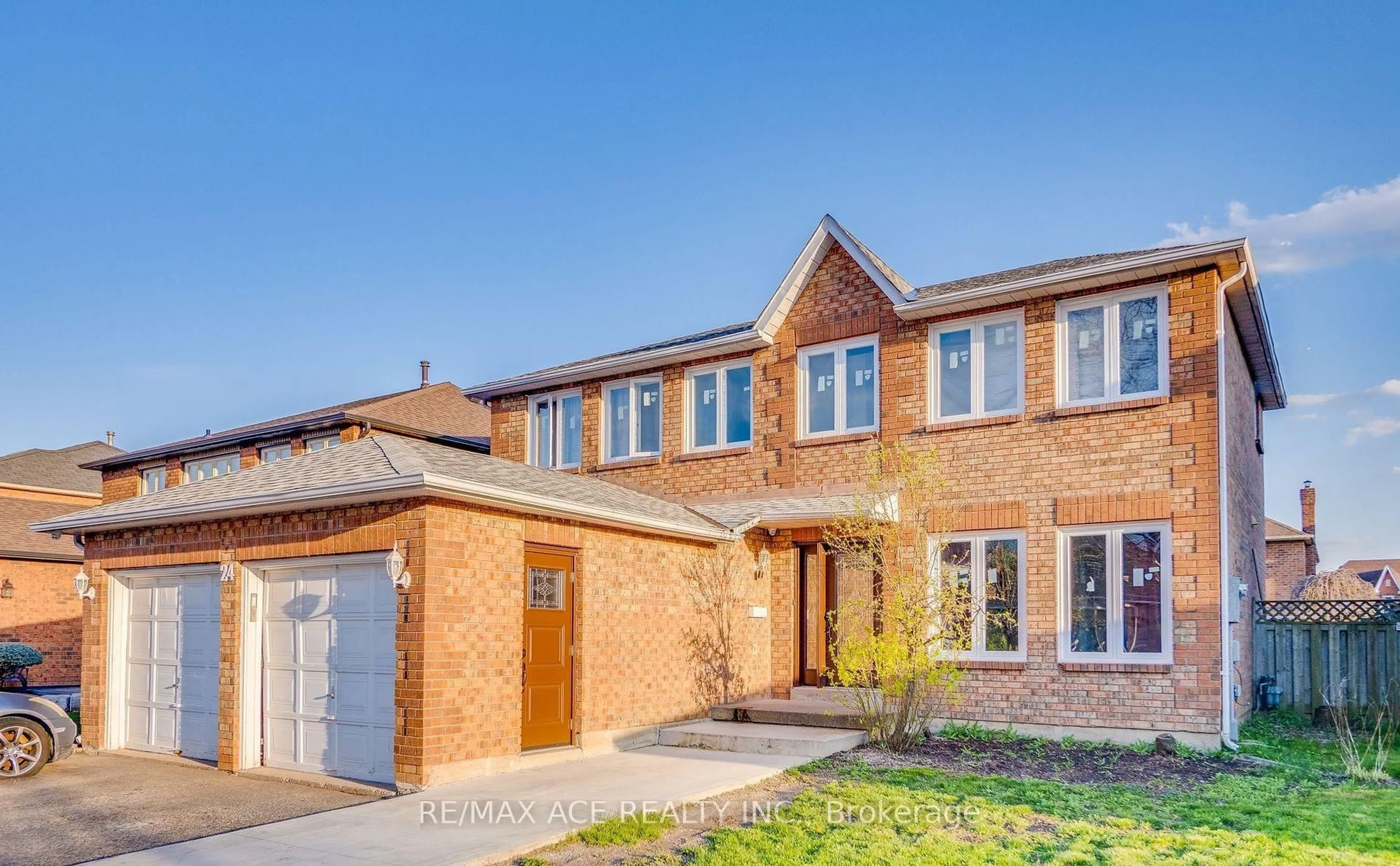 Home with brick exterior material, street for 24 Major William Sharpe Dr, Brampton Ontario L6X 3K3