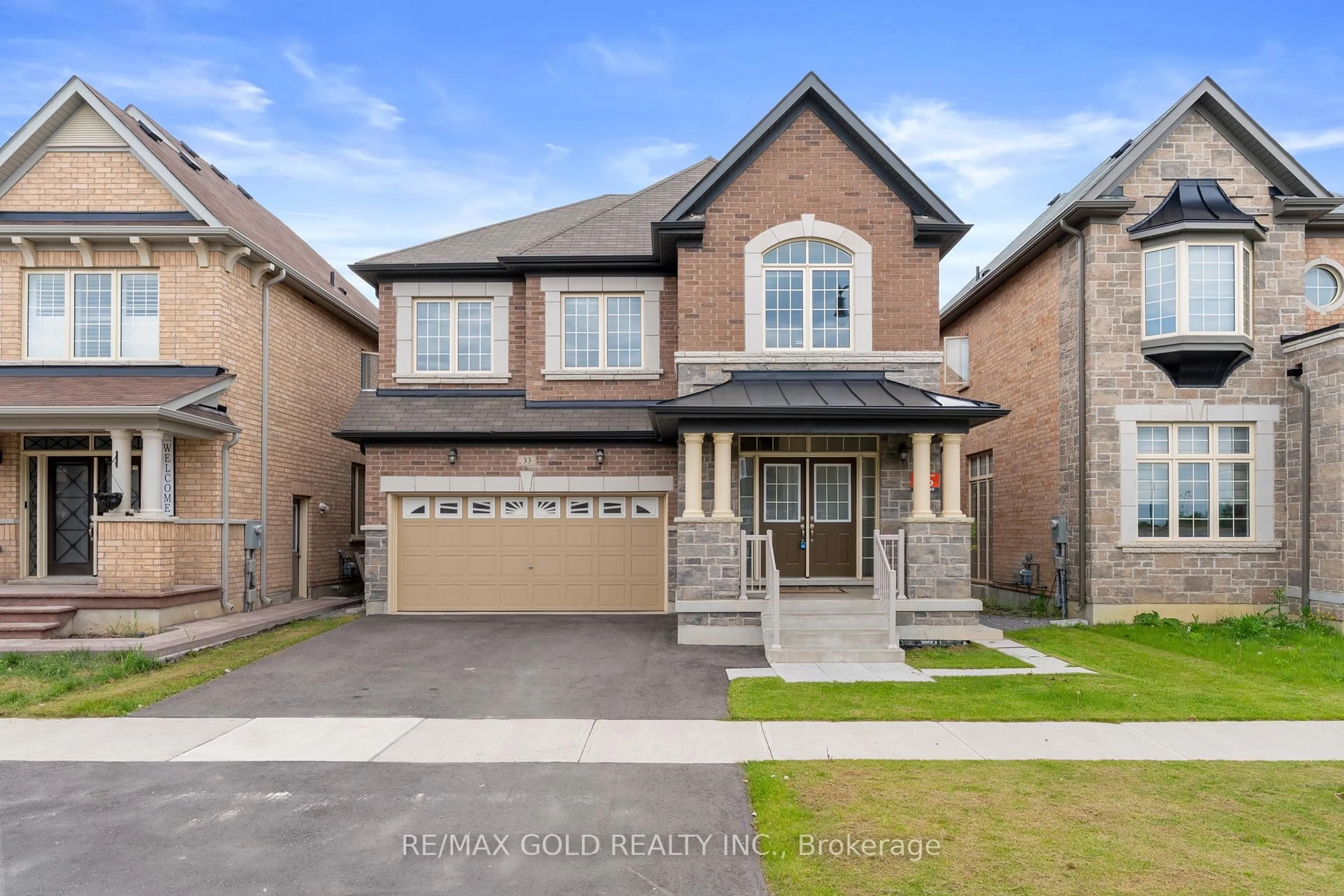 Home with brick exterior material, street for 33 Tiger Cres, Brampton Ontario L6R 0C8