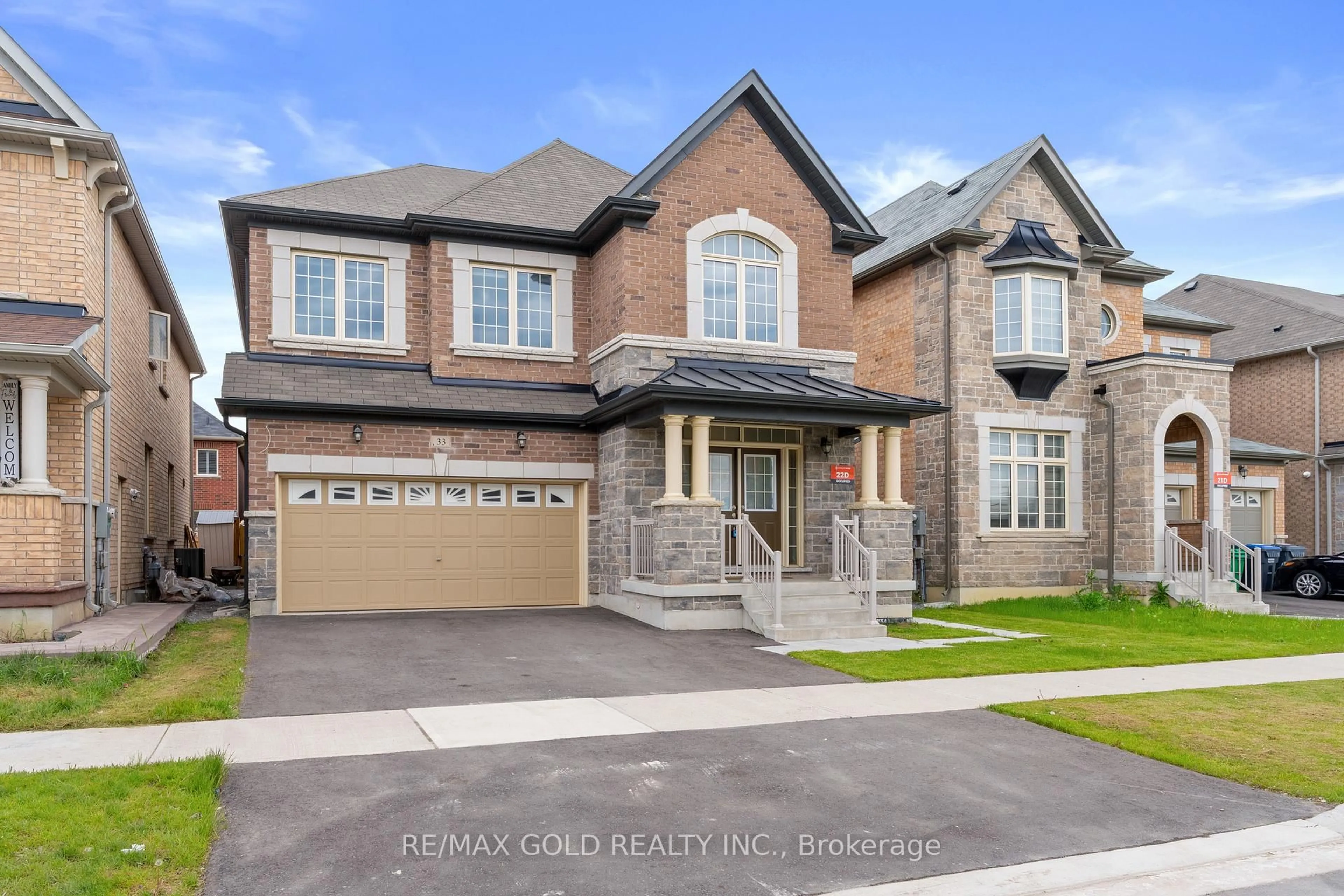 Home with brick exterior material, street for 33 Tiger Cres, Brampton Ontario L6R 0C8