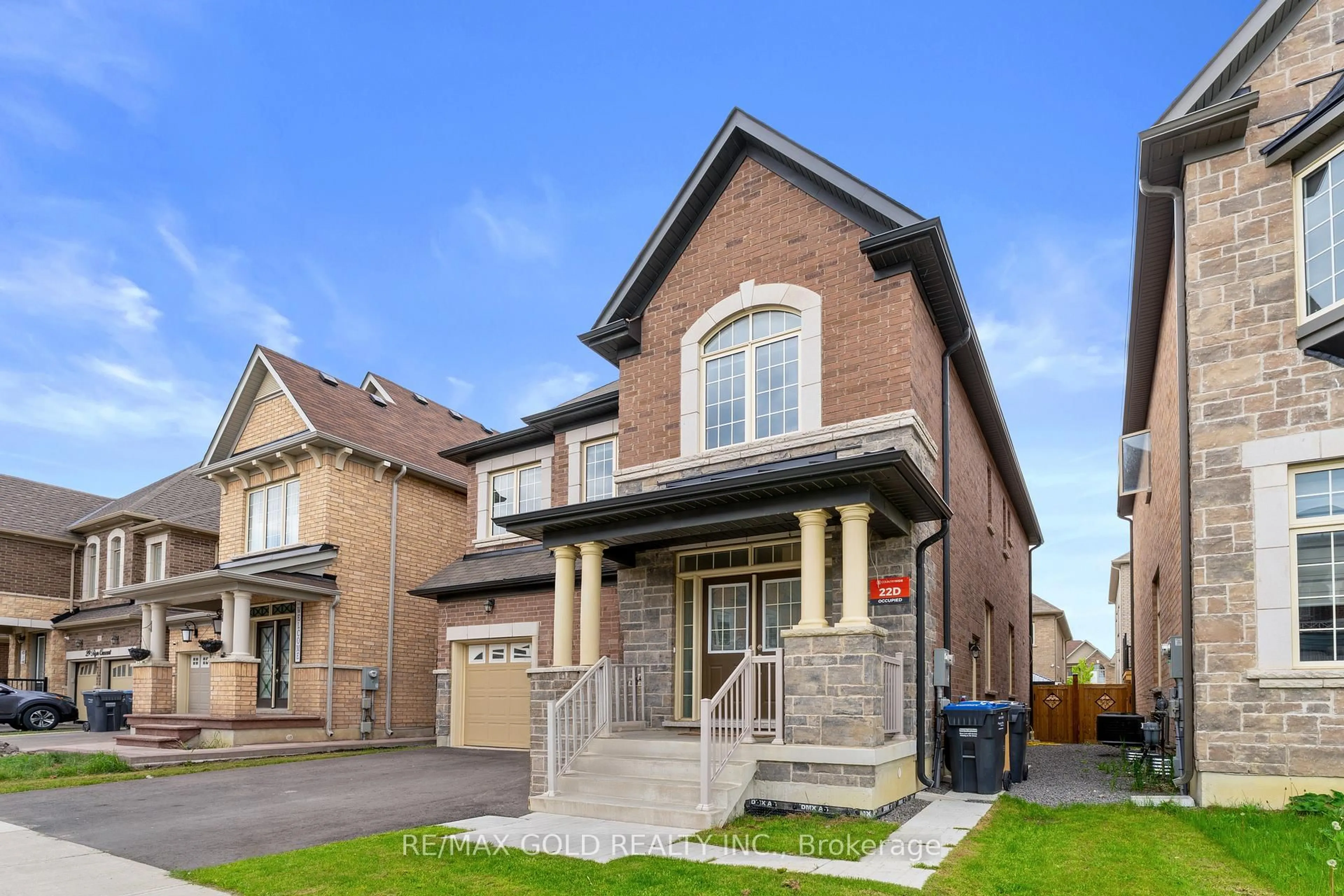 Home with brick exterior material, street for 33 Tiger Cres, Brampton Ontario L6R 0C8