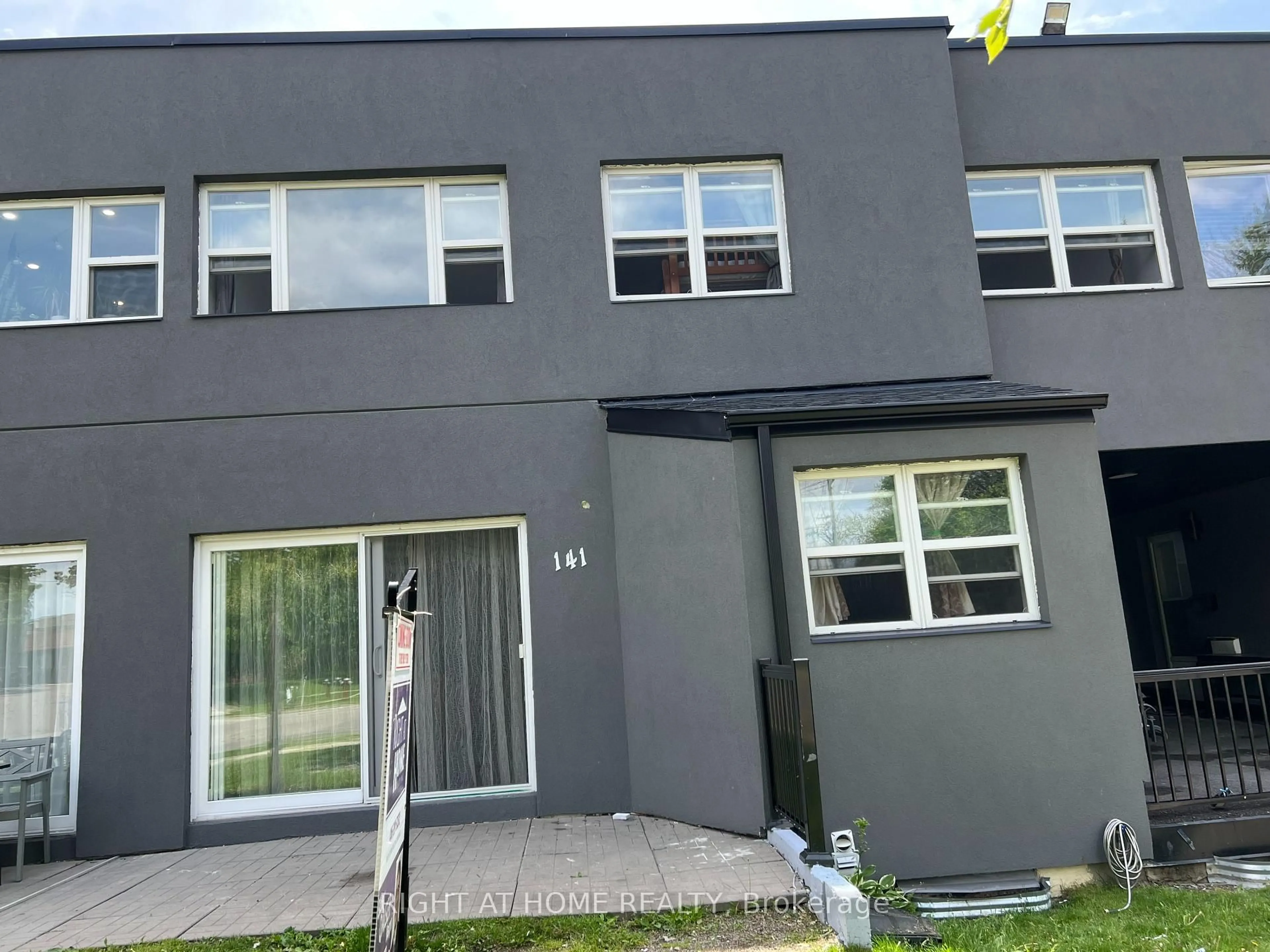 A pic from outside/outdoor area/front of a property/back of a property/a pic from drone, street for 3040 Constitution Blvd #141, Mississauga Ontario L4Y 3X7