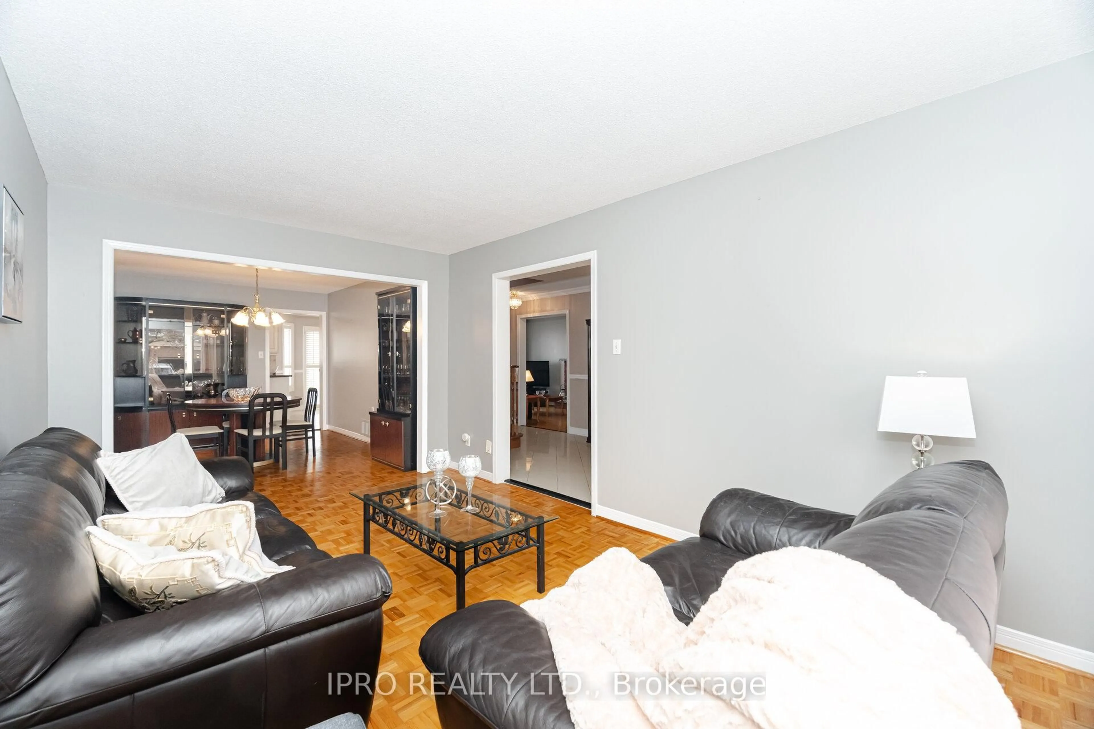 Living room with furniture, wood/laminate floor for 97 Major Wm. Sharpe Dr, Brampton Ontario L6X 3V1