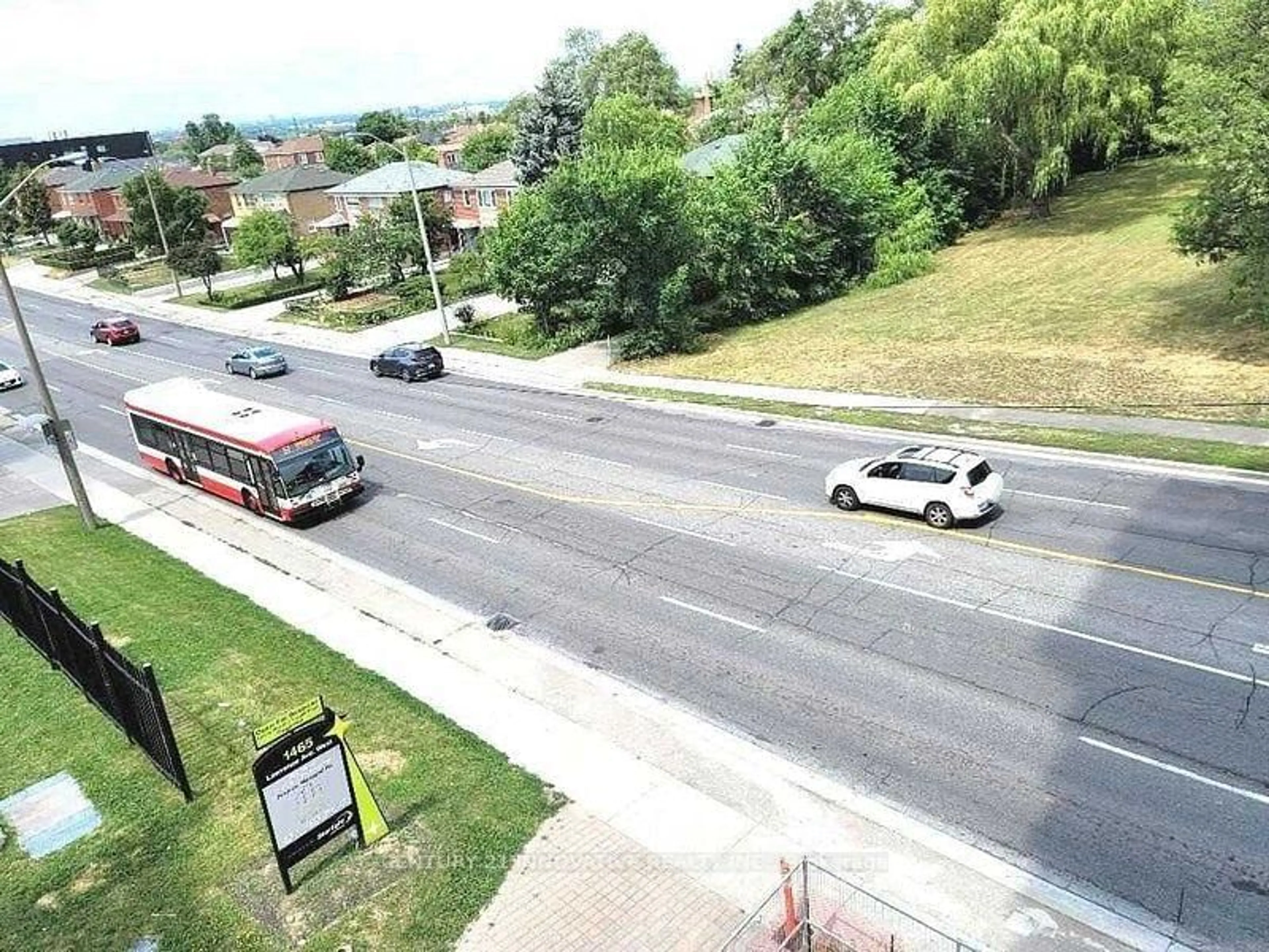 A pic from outside/outdoor area/front of a property/back of a property/a pic from drone, street for 1461 lawrence Ave #302, Toronto Ontario M6L 1A9