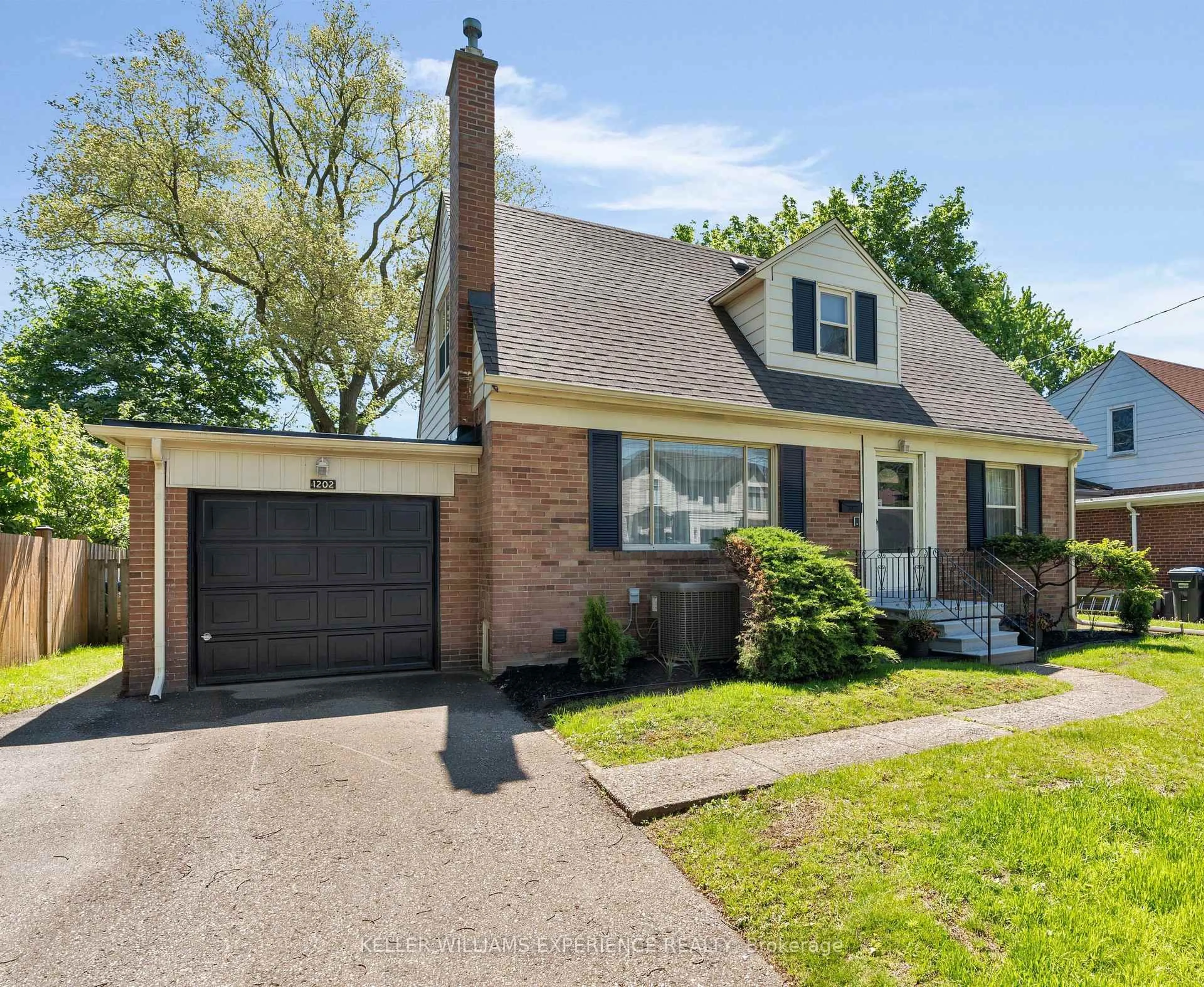 Home with brick exterior material, street for 1202 Greening Ave, Mississauga Ontario L4Y 1H5