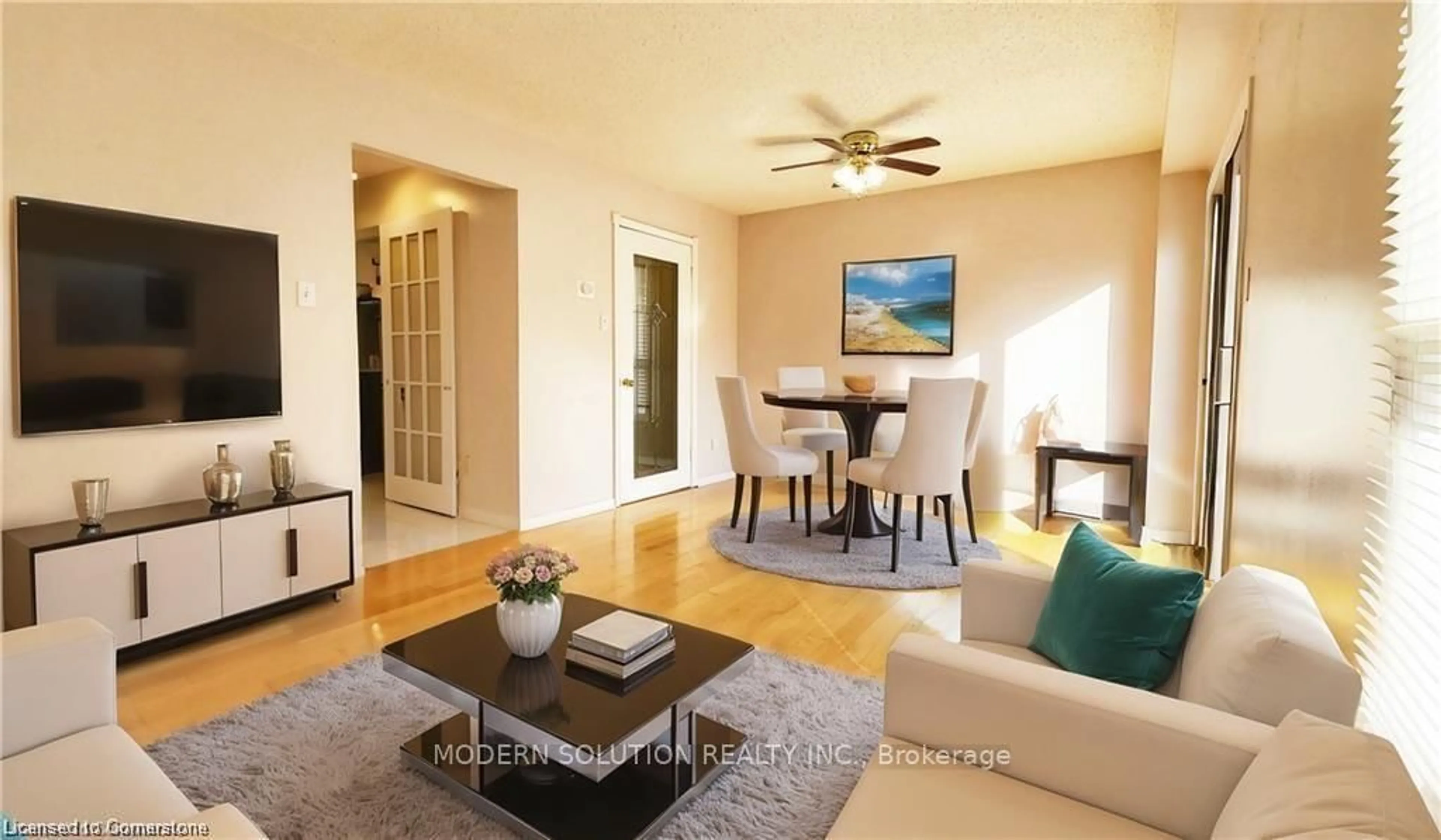 Living room with furniture, wood/laminate floor for 20 Wallingford Crt, Brampton Ontario L6Y 4V7