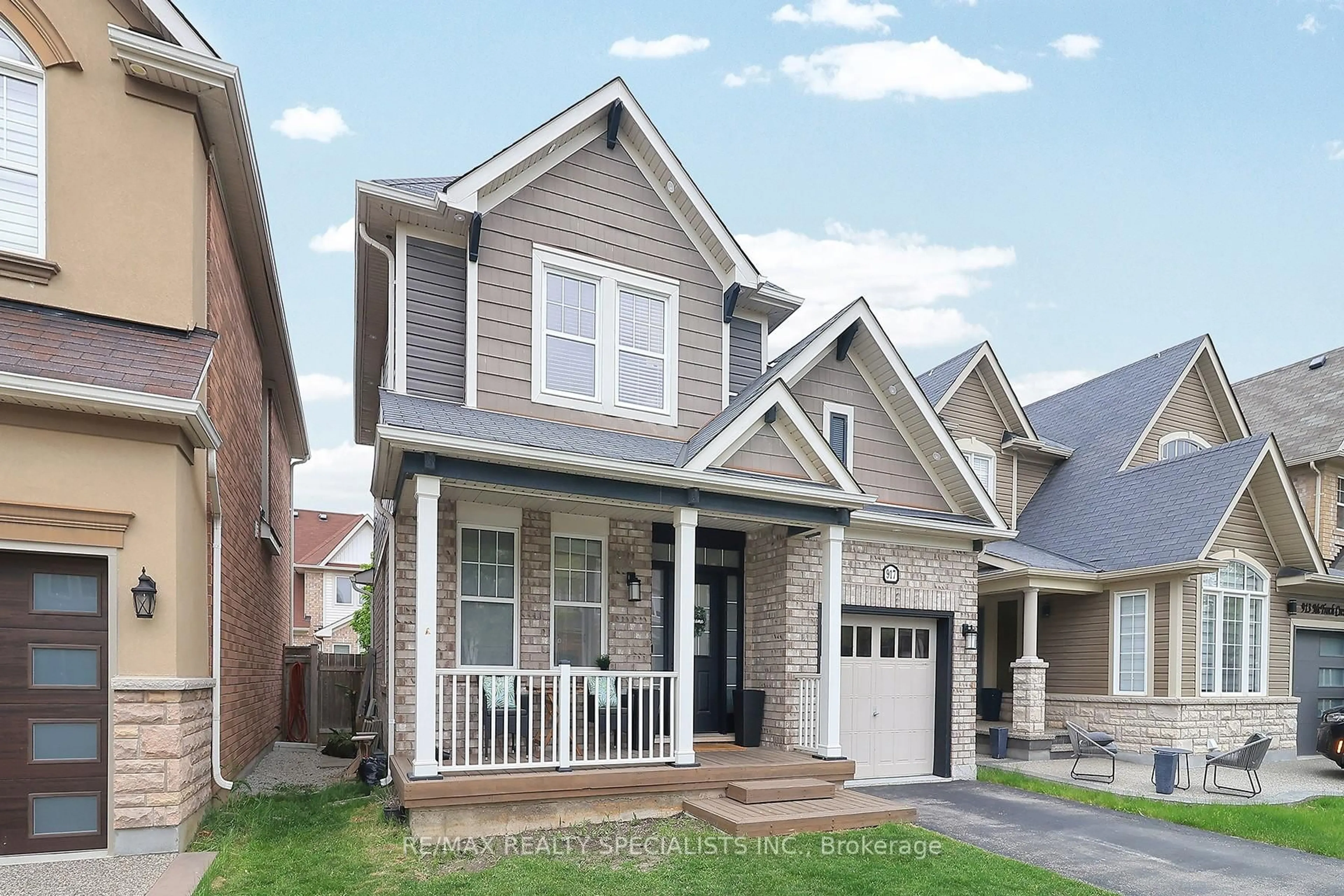 Home with brick exterior material, street for 917 MCTRACH Cres, Milton Ontario L9T 1M5
