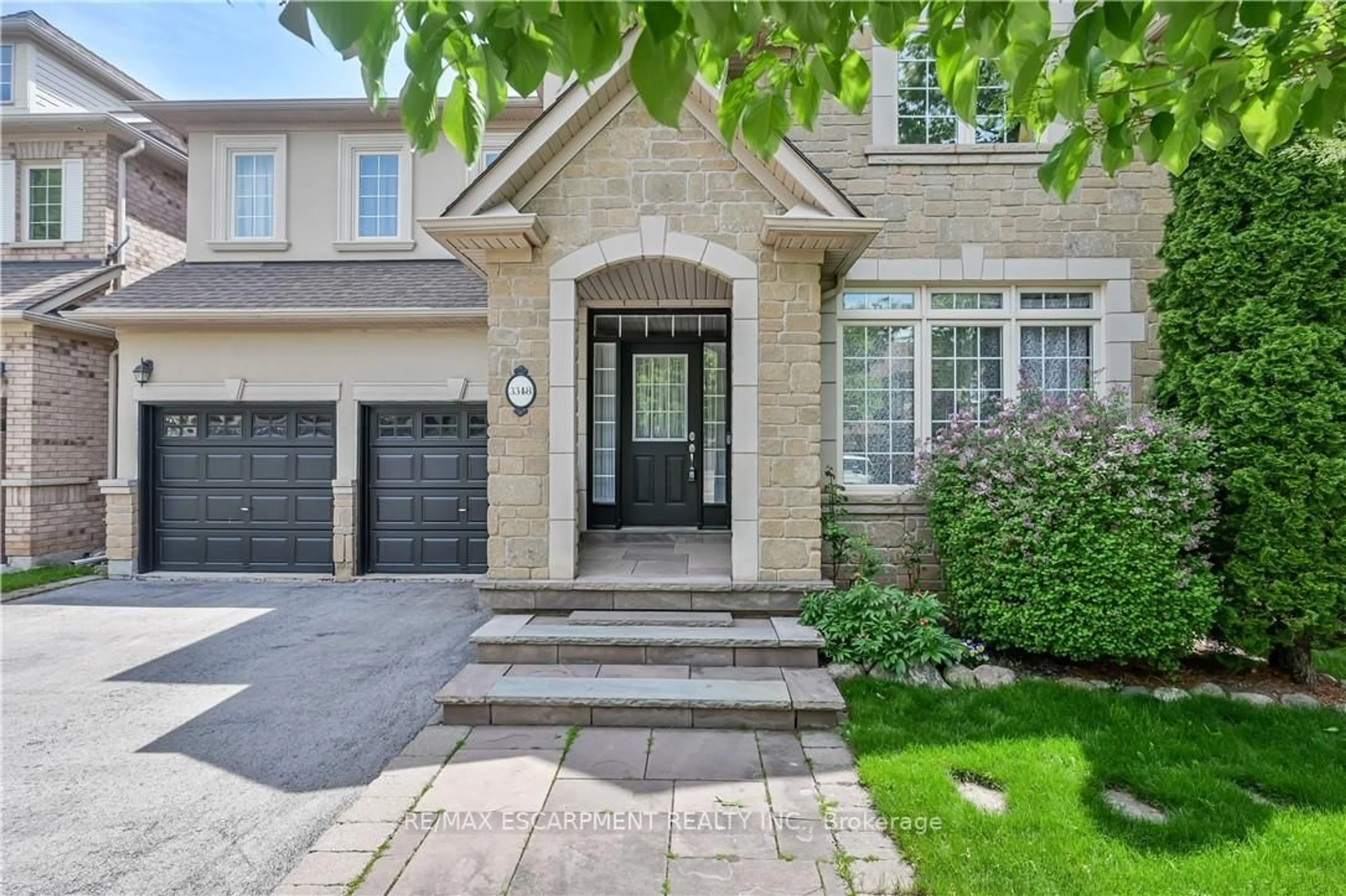 Home with brick exterior material, street for 3348 Raspberry Bush Tr, Oakville Ontario L6L 6V2