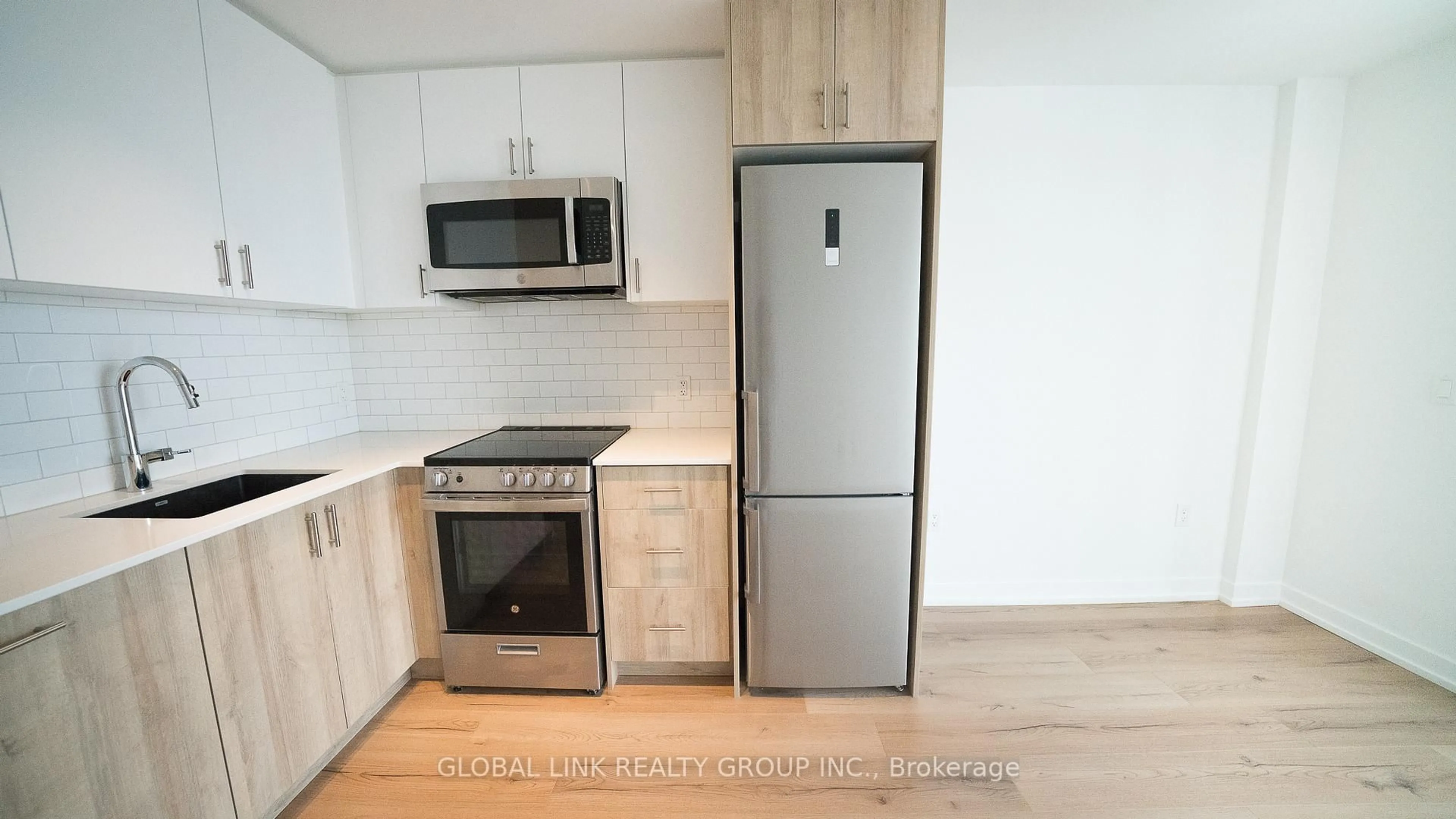 Standard kitchen, wood/laminate floor for 1195 The Queensway Way #501, Toronto Ontario M8Z 0H1