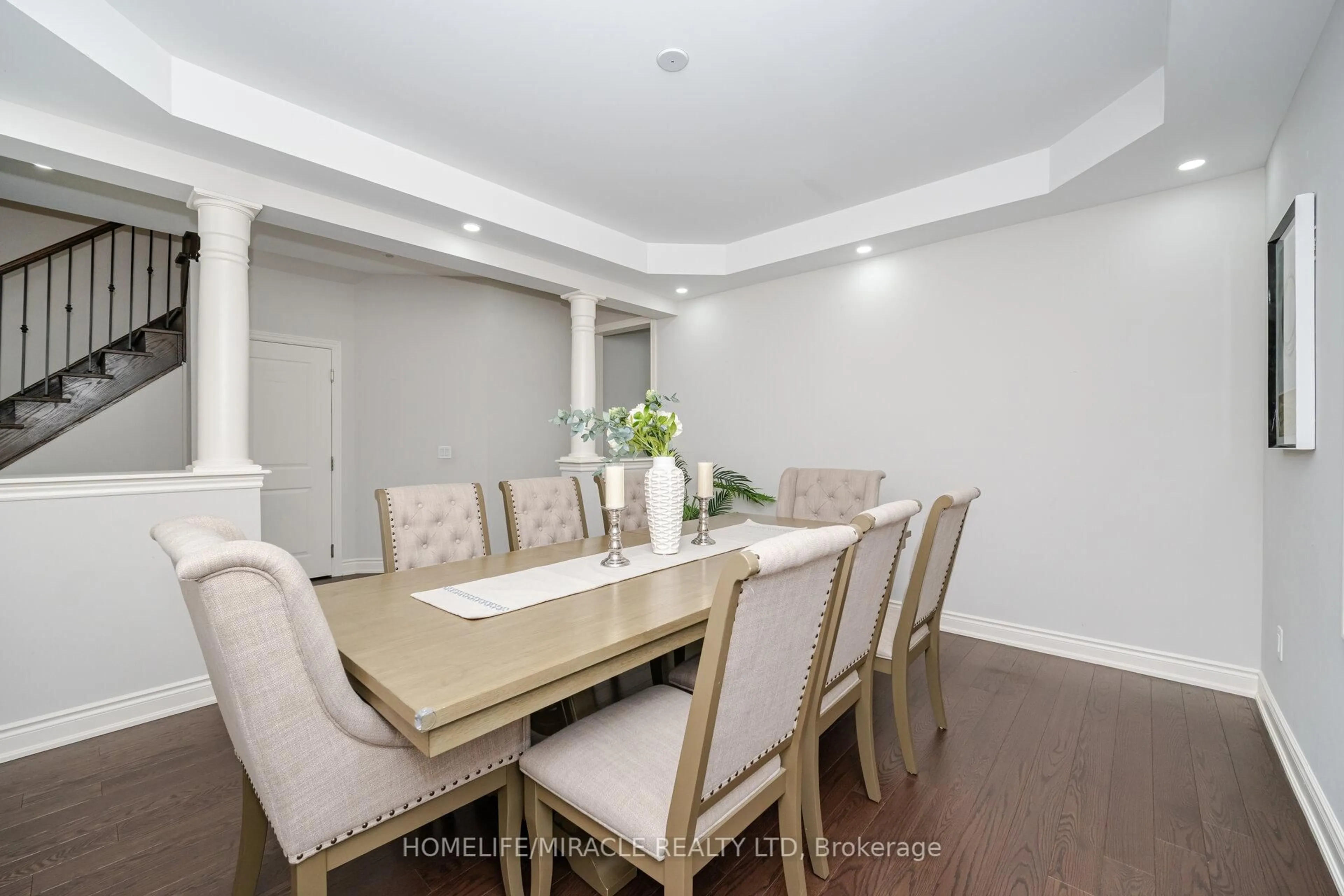 Dining room, wood/laminate floor for 23 Elverton Cres, Brampton Ontario L7A 4Z4