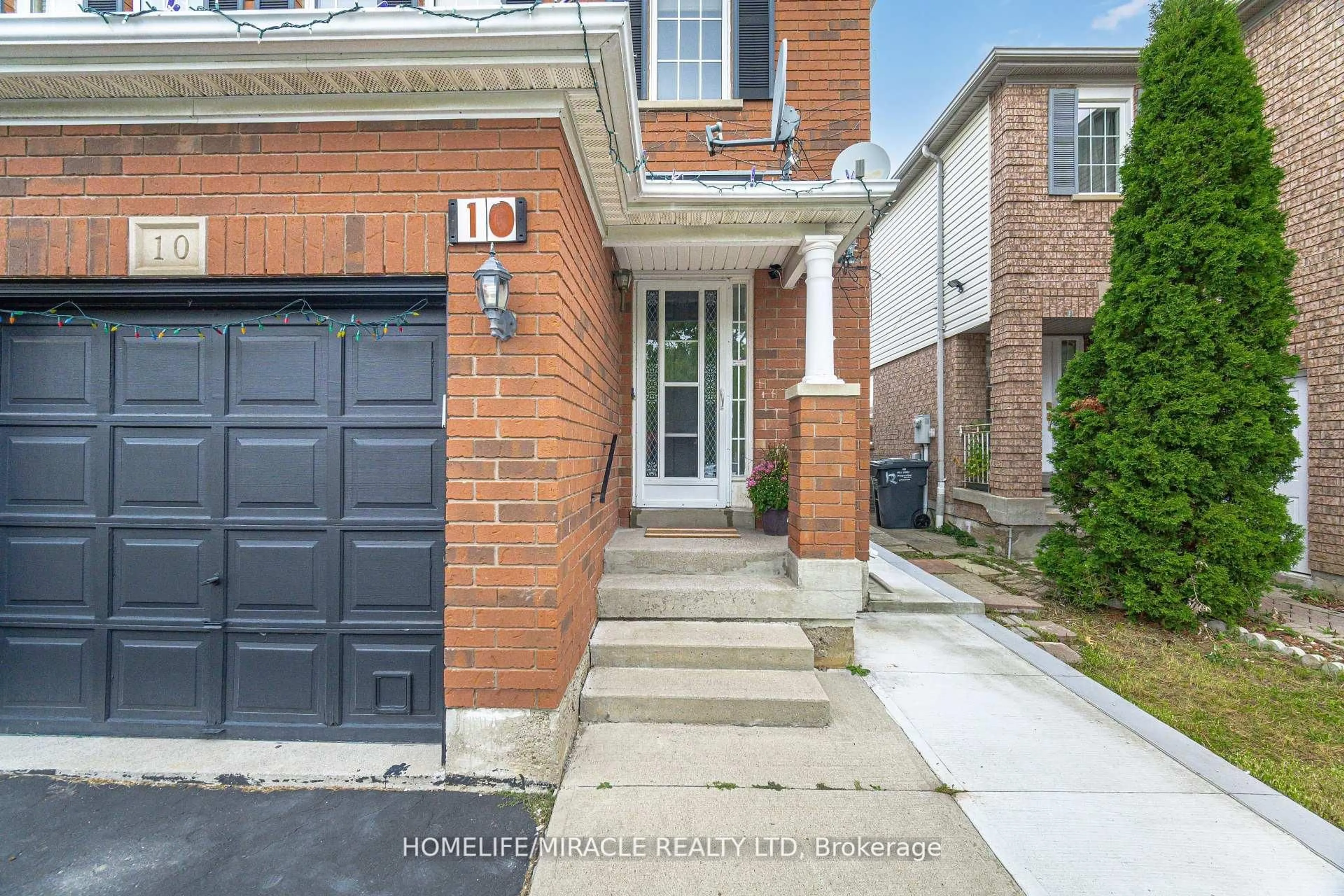 Home with brick exterior material, street for 10 Hackberry Gate, Brampton Ontario L6R 2E7