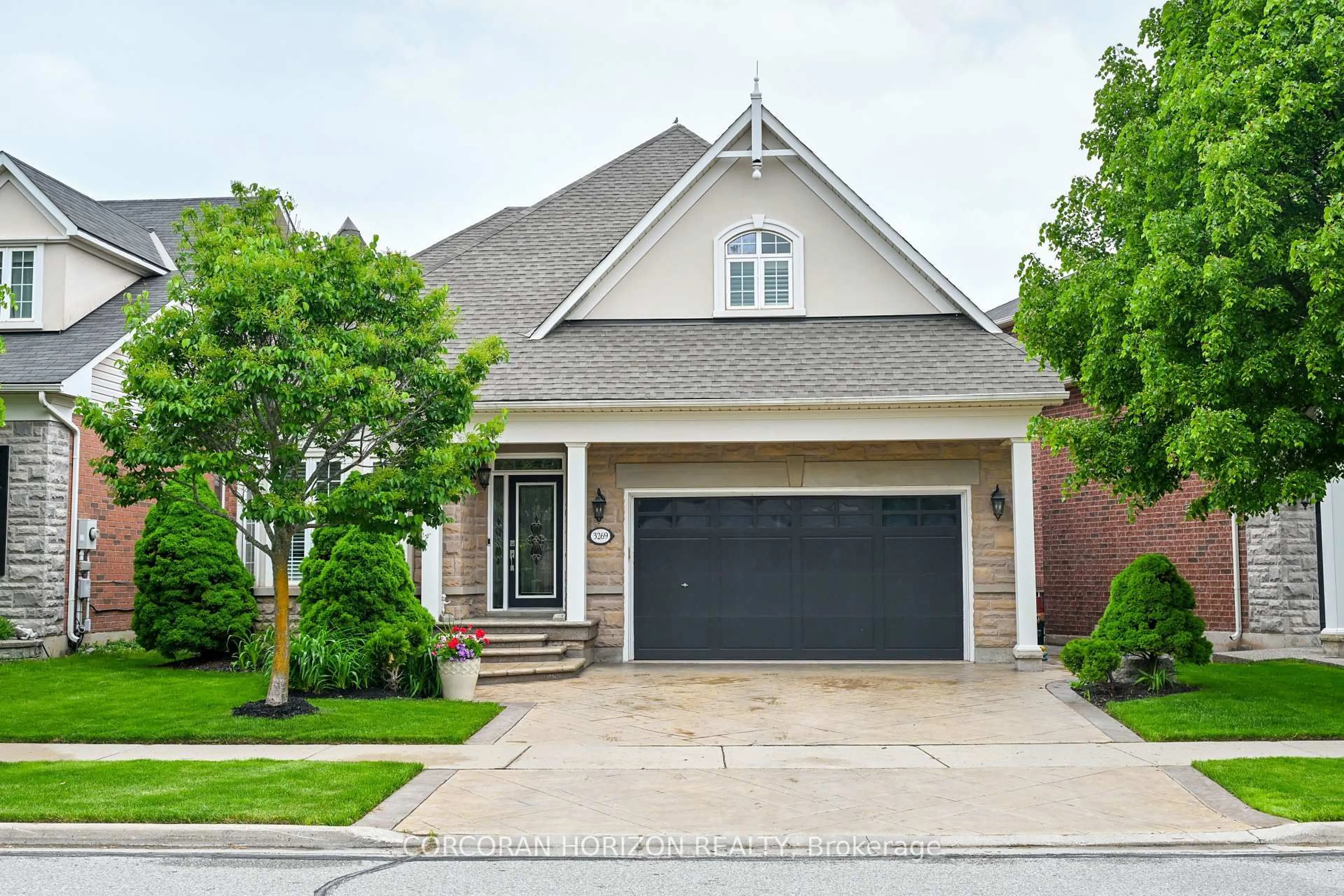 Home with brick exterior material, street for 3269 Stocksbridge Ave, Oakville Ontario L6M 0E3