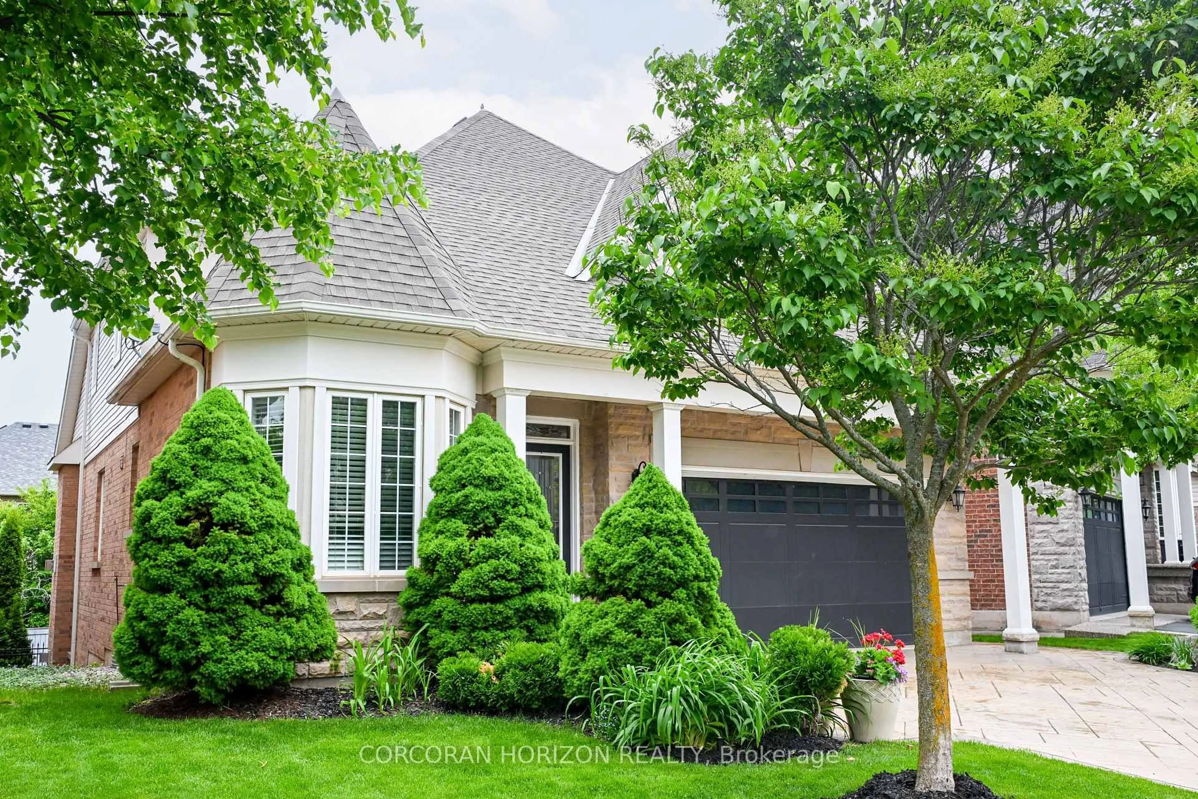 Home with brick exterior material, street for 3269 Stocksbridge Ave, Oakville Ontario L6M 0E3