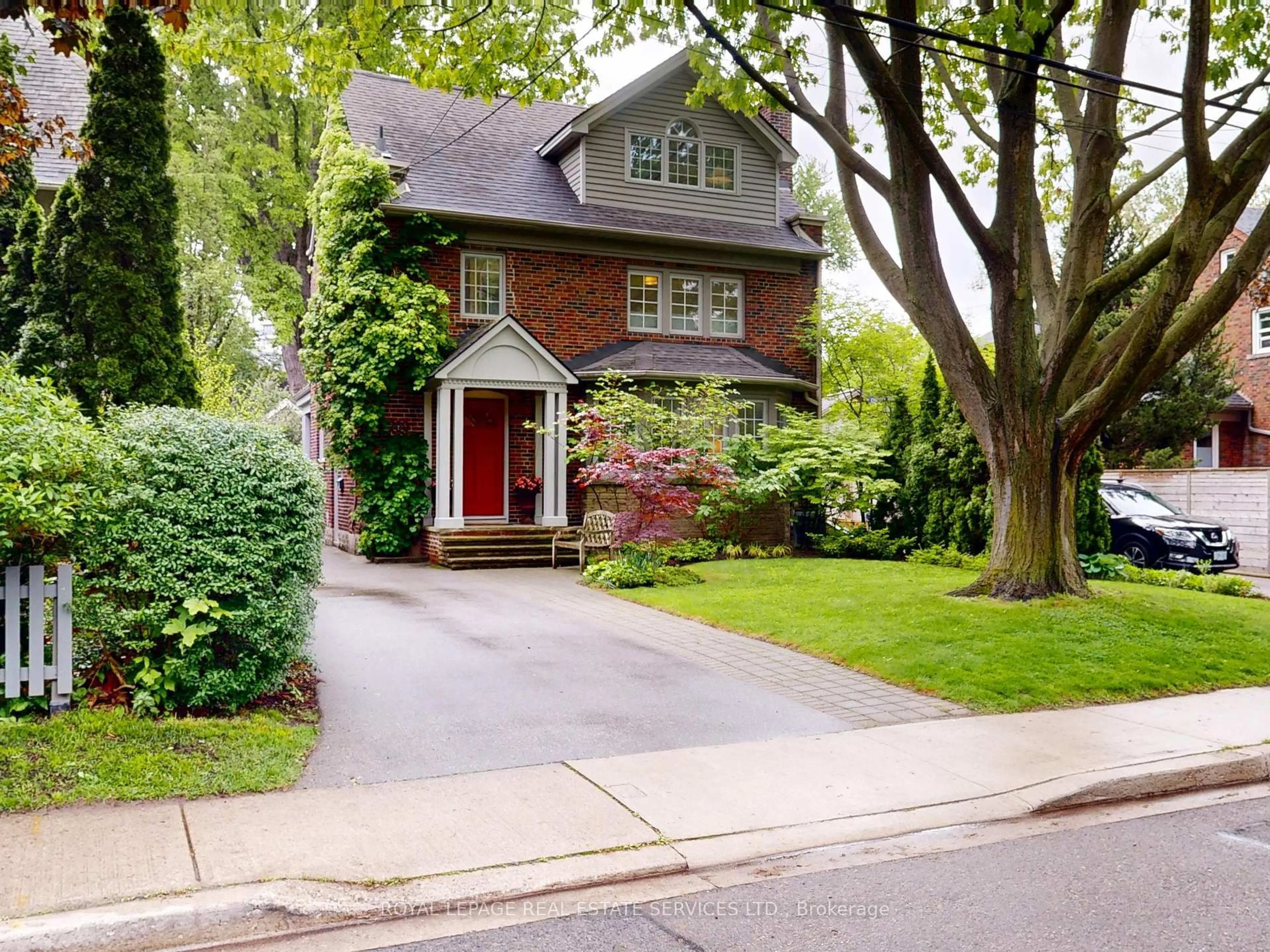 Home with brick exterior material, street for 509 Riverside Dr, Toronto Ontario M6S 4B7