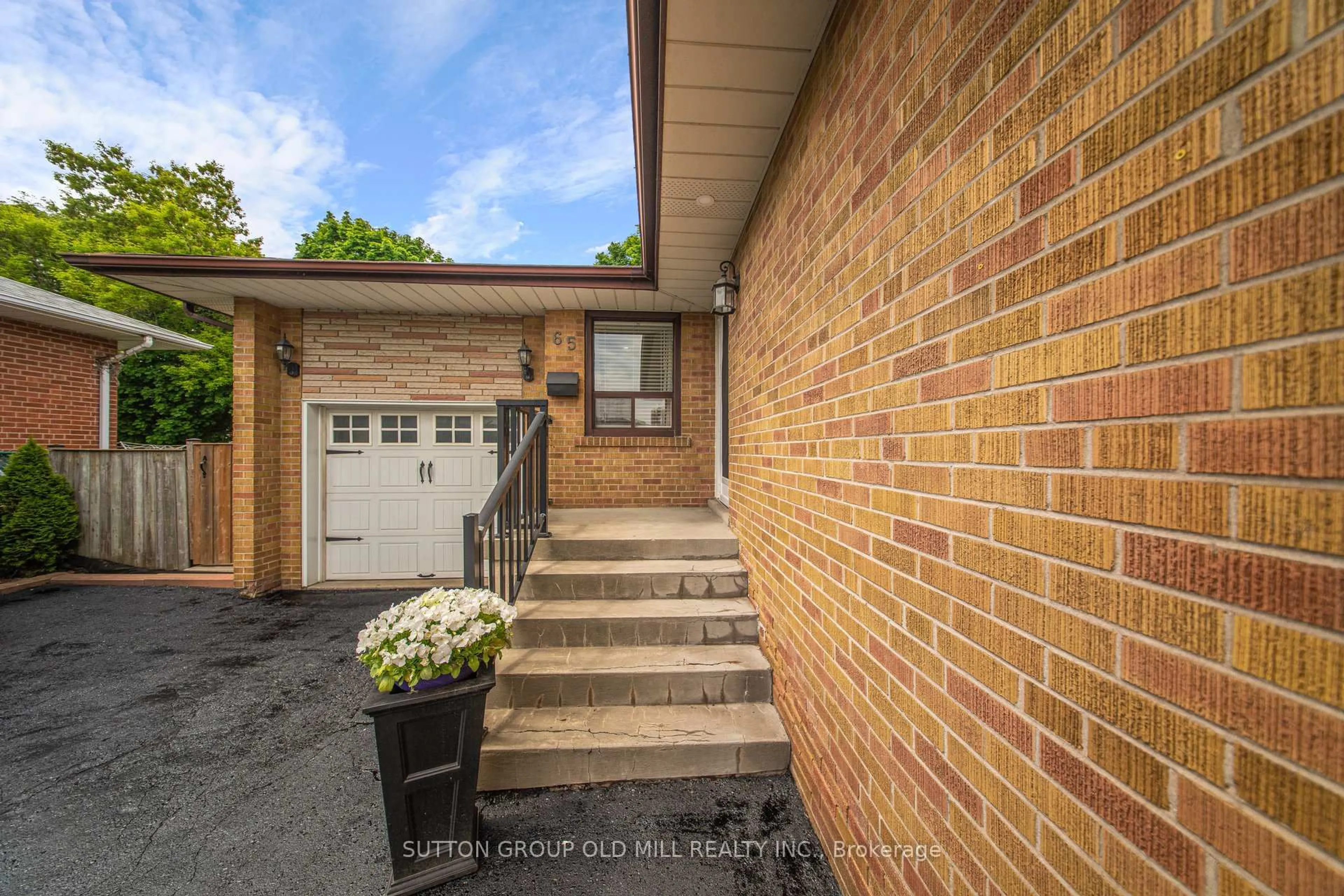 Home with brick exterior material, street for 65 Ashwood Cres, Brampton Ontario L6T 1M1