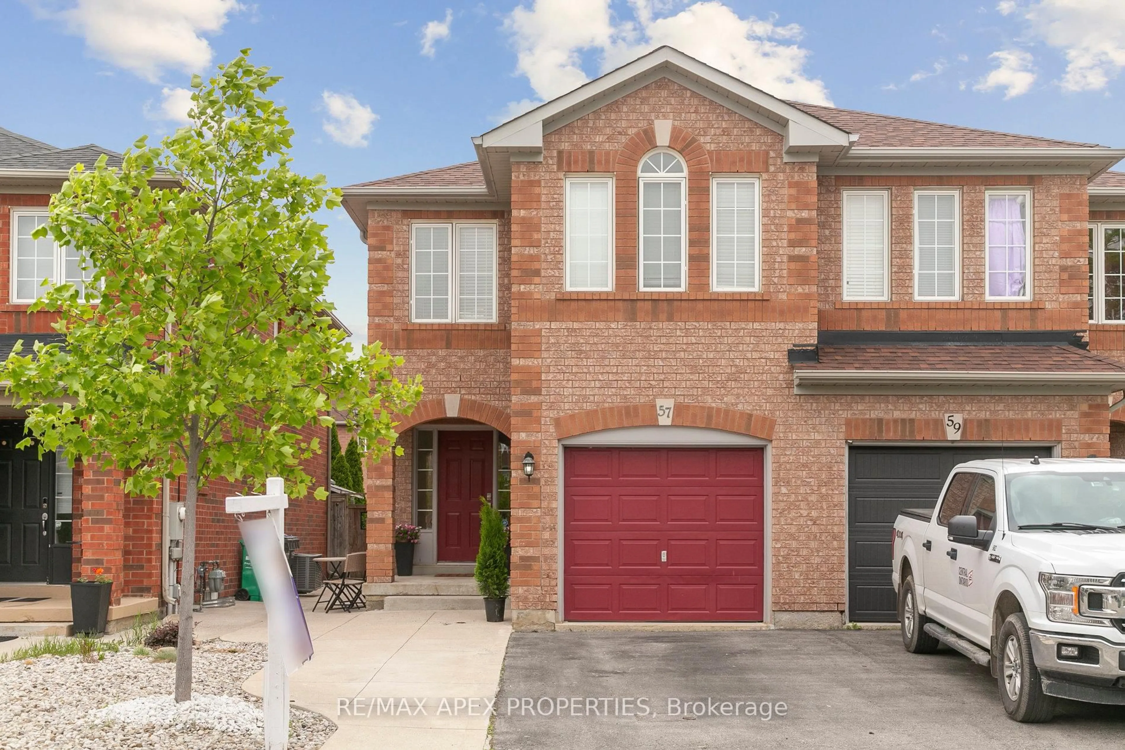 Home with brick exterior material, street for 57 Roadmaster Lane, Brampton Ontario L7A 3A9