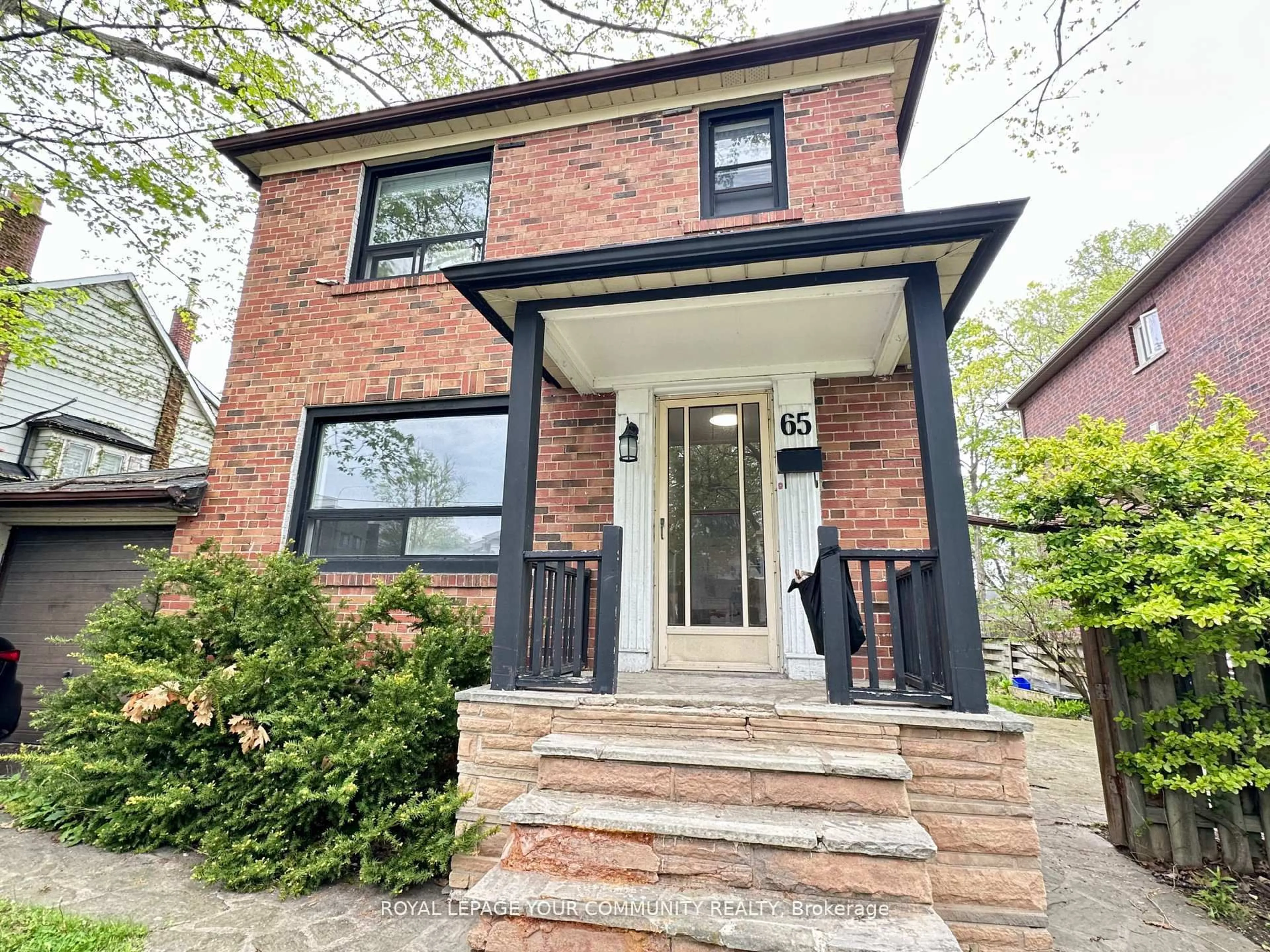 Home with brick exterior material, street for 65 Long Branch Ave, Toronto Ontario M8W 3J3