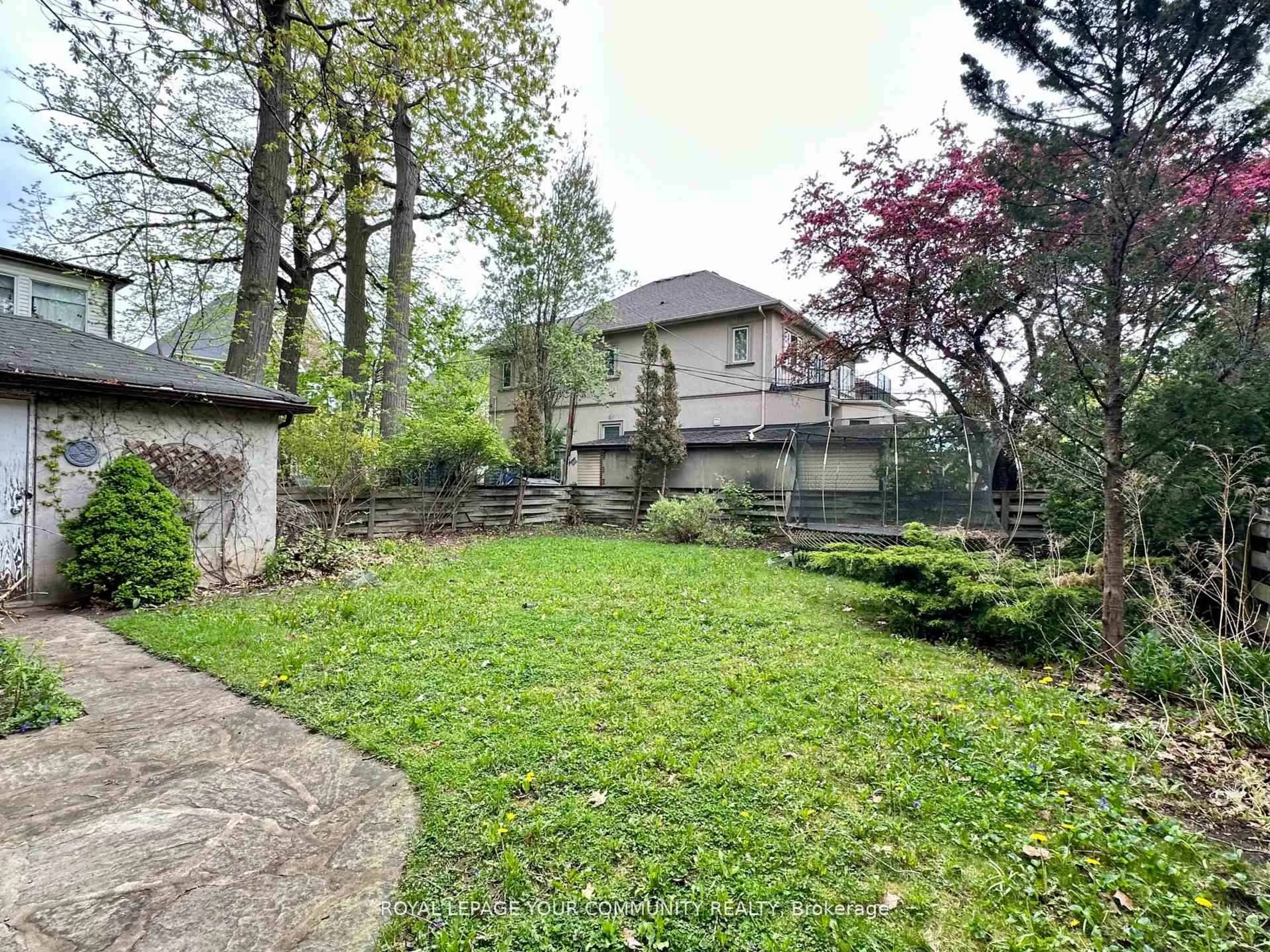 A pic from outside/outdoor area/front of a property/back of a property/a pic from drone, forest/trees view for 65 Long Branch Ave, Toronto Ontario M8W 3J3