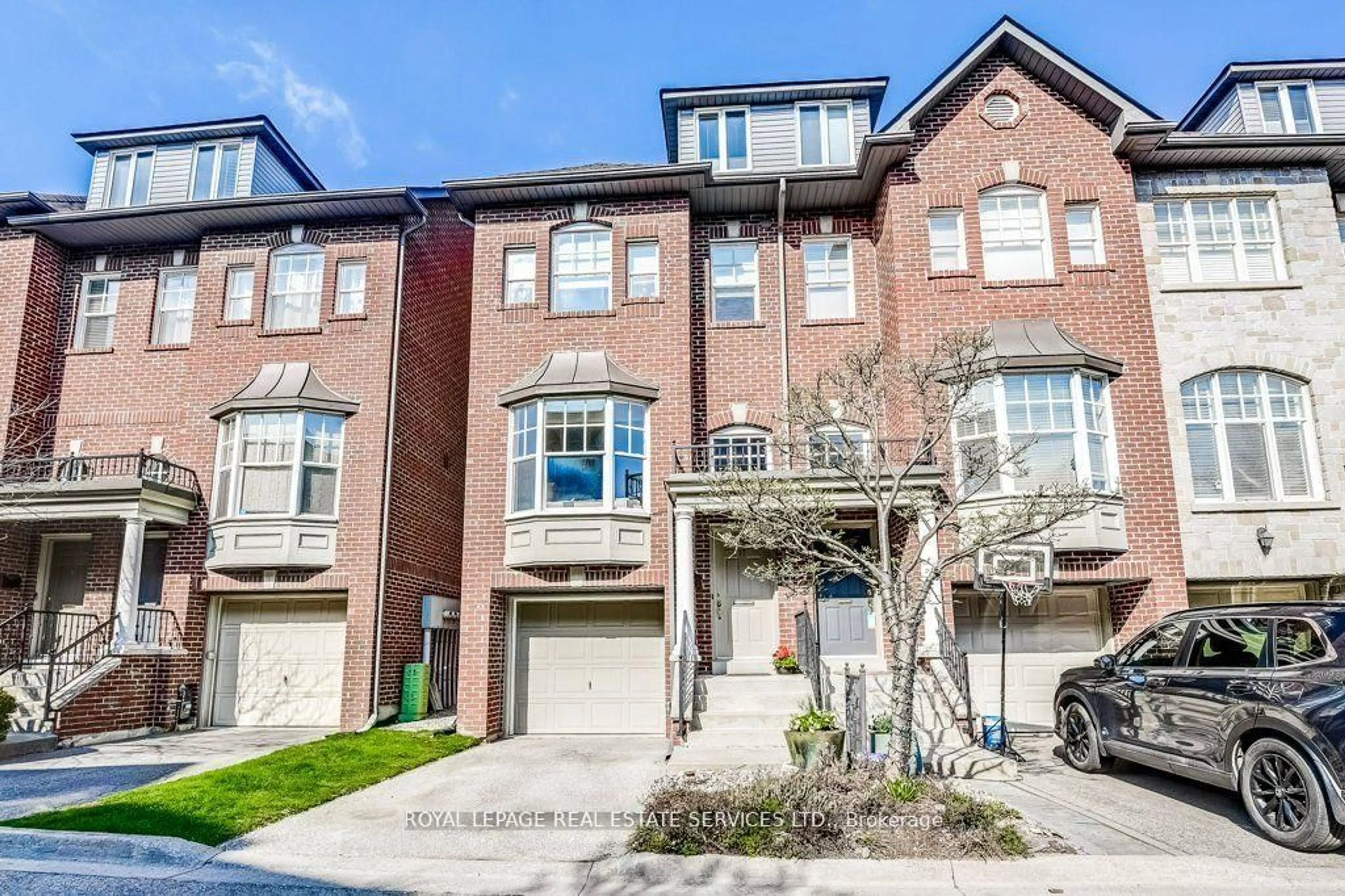 Home with brick exterior material, street for 17 Leaves Terr, Toronto Ontario M8Y 4H4