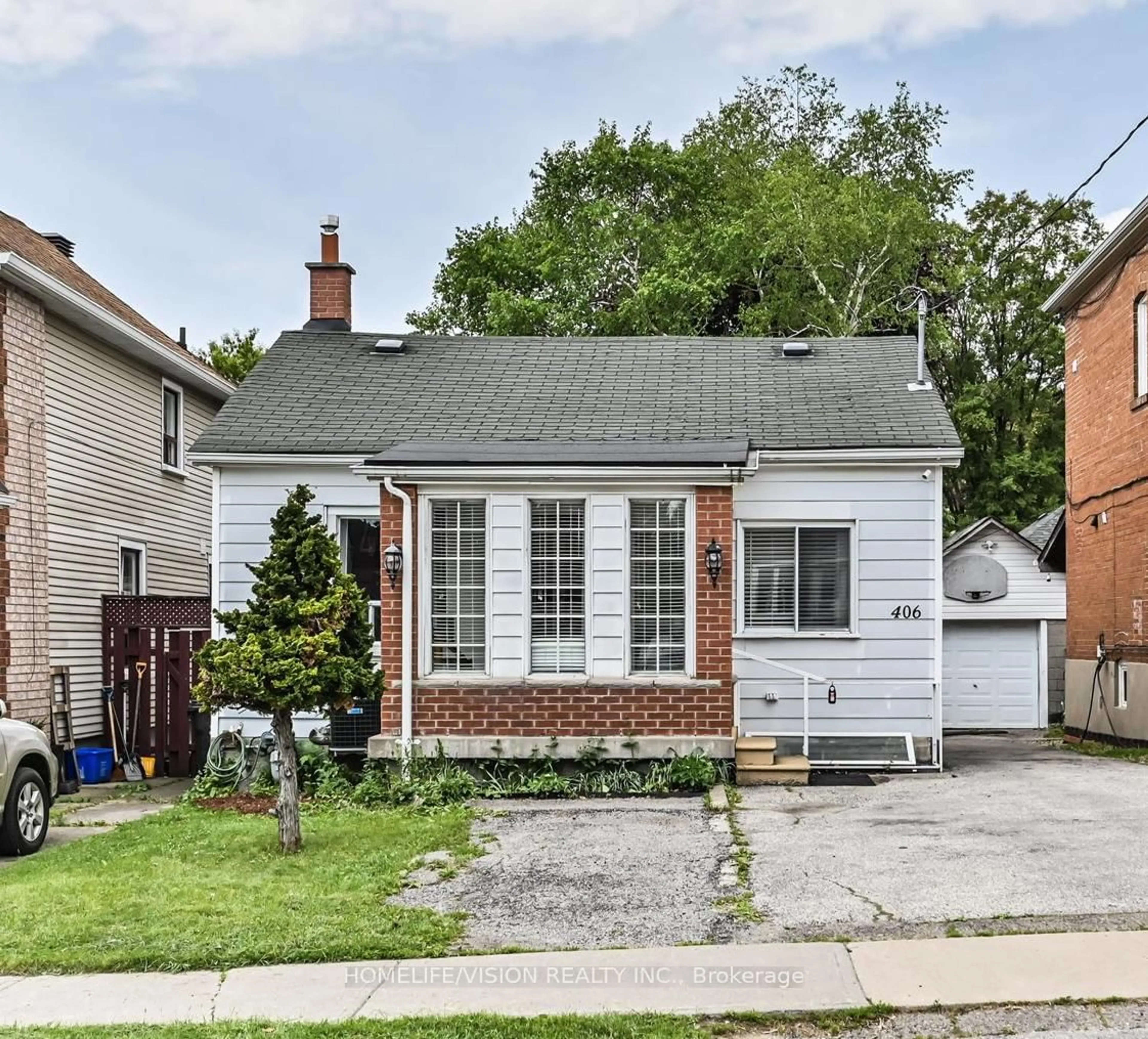 Home with brick exterior material, street for 406 Nairn Ave, Toronto Ontario M6E 4J3