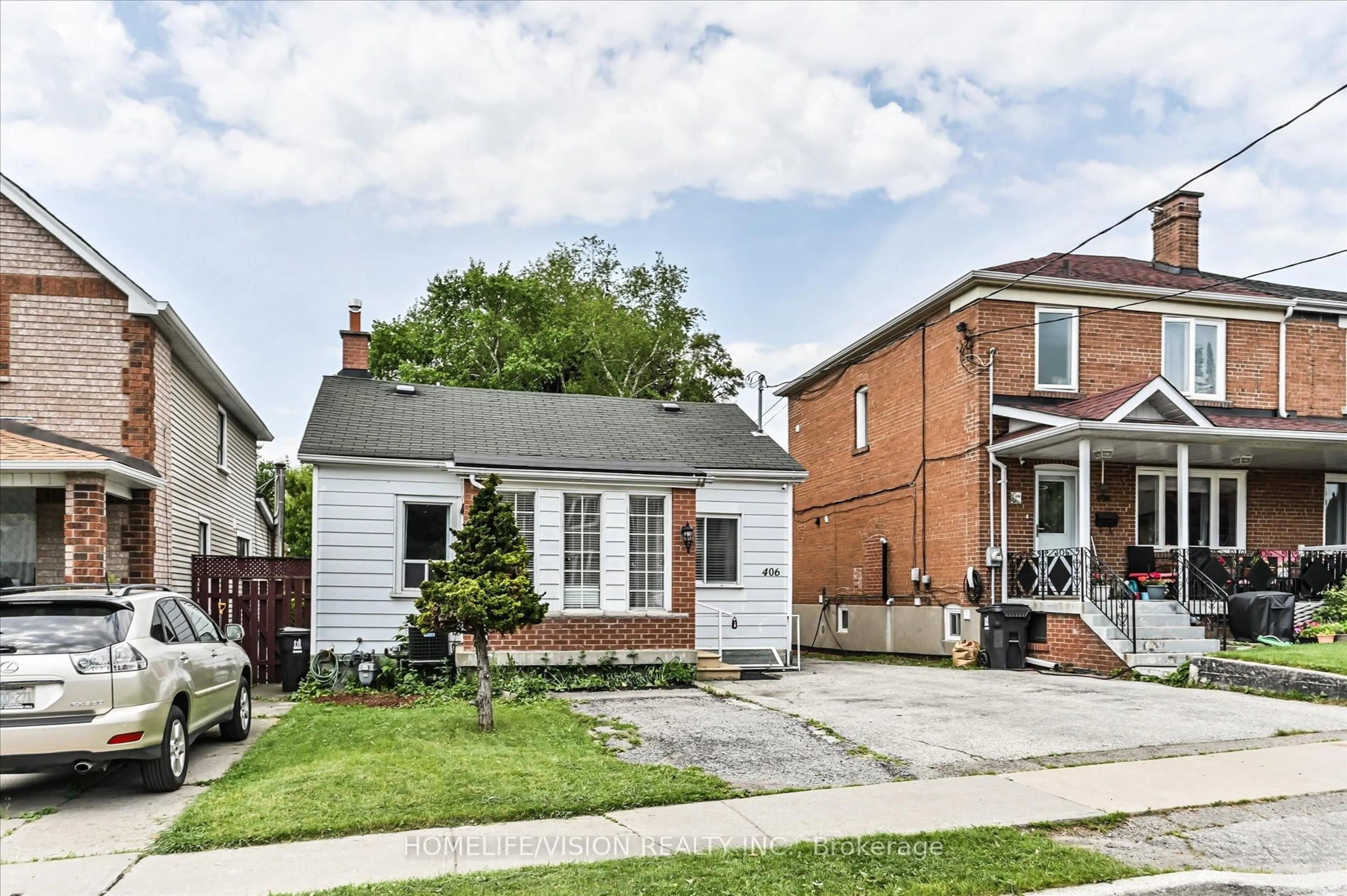 Home with brick exterior material, street for 406 Nairn Ave, Toronto Ontario M6E 4J3