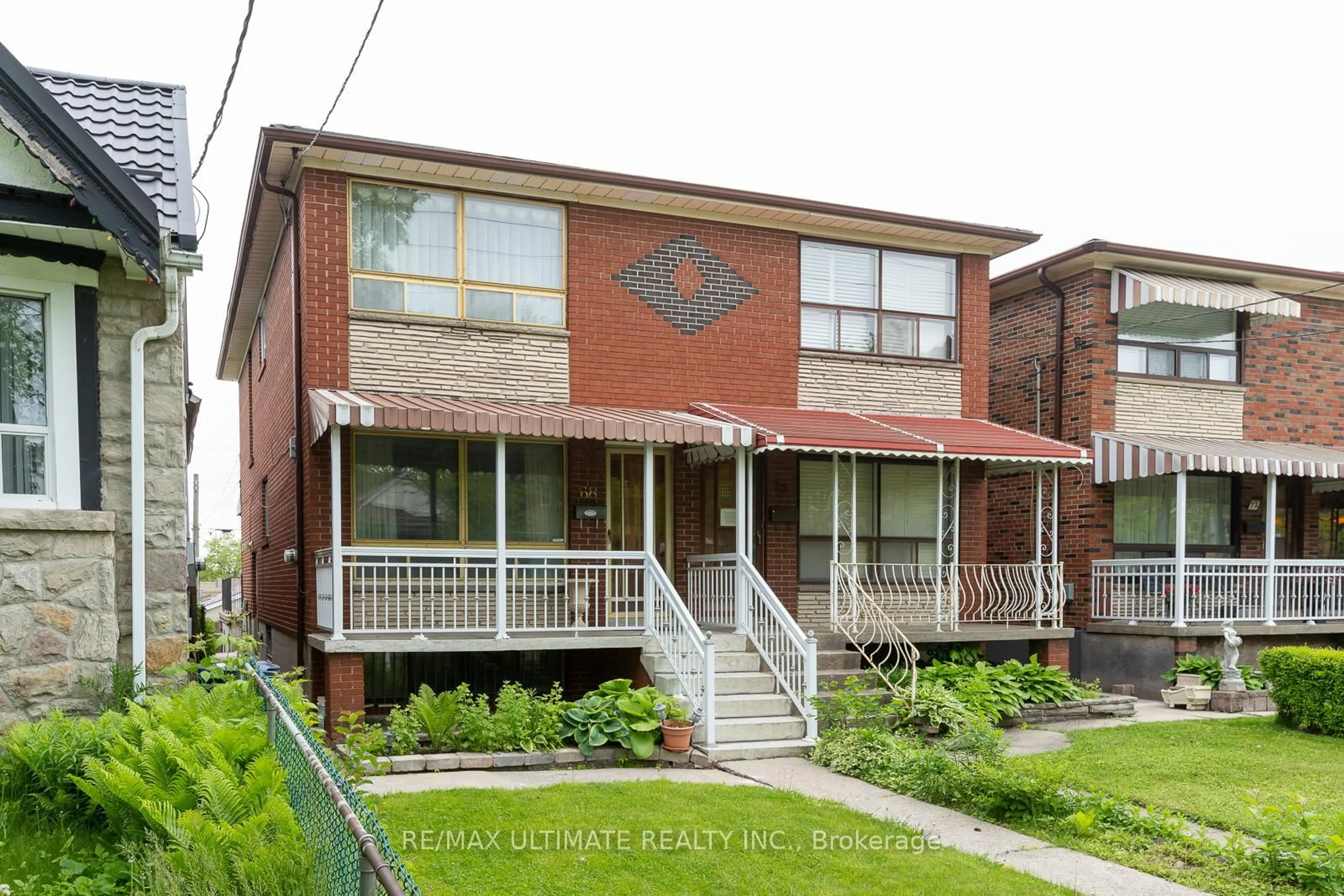Home with brick exterior material, street for 68 Caledonia Rd, Toronto Ontario M6E 4S6