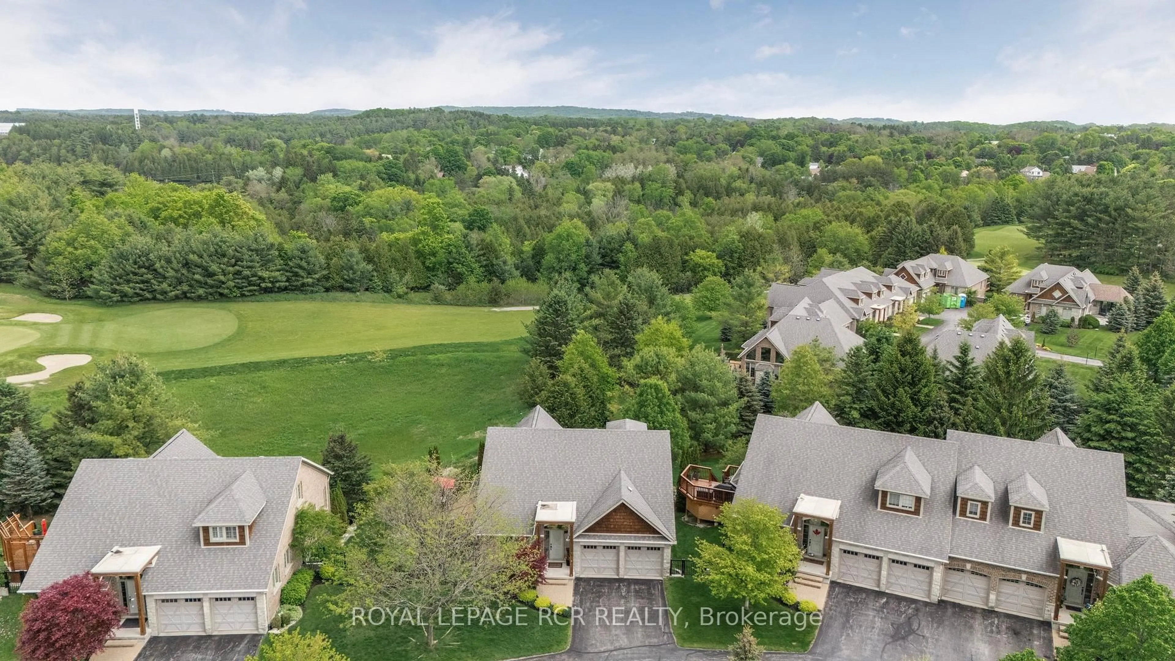 A pic from outside/outdoor area/front of a property/back of a property/a pic from drone, mountain view for 1 Reddington Dr #4, Caledon Ontario L7E 4C4