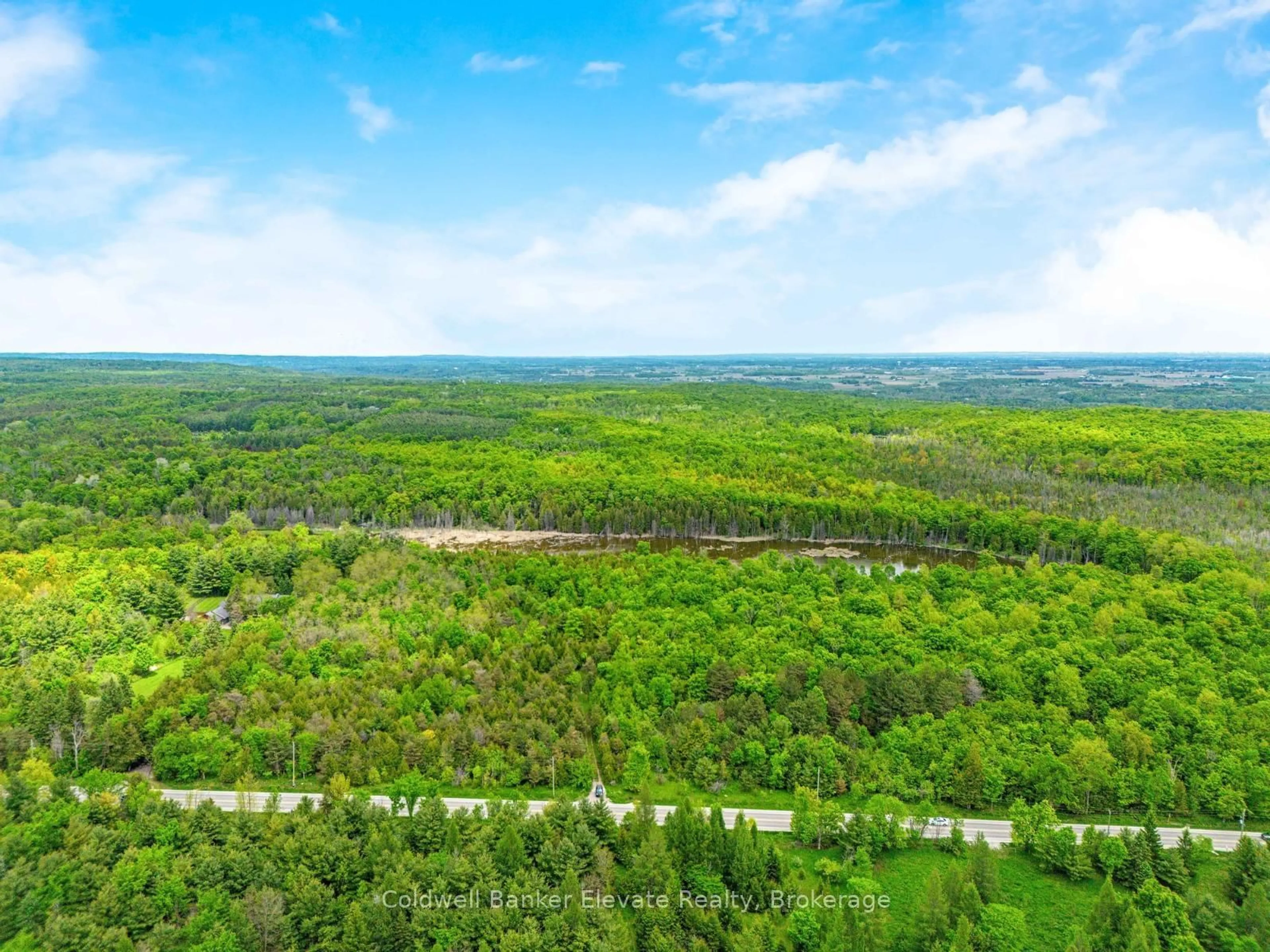 A pic from outside/outdoor area/front of a property/back of a property/a pic from drone, forest/trees view for 14915 Winston Churchill Blvd, Caledon Ontario L7C 1S7