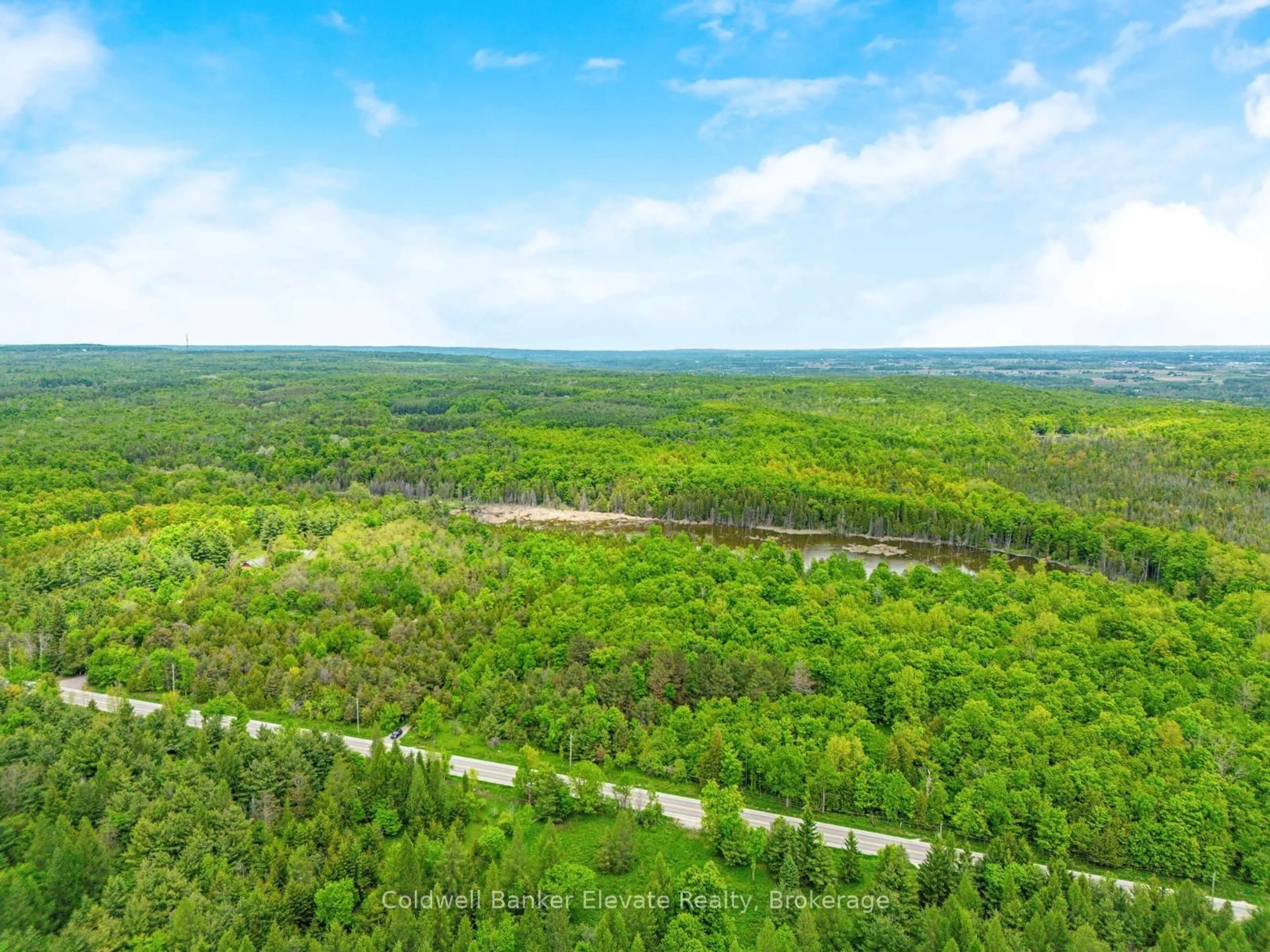A pic from outside/outdoor area/front of a property/back of a property/a pic from drone, forest/trees view for 14915 Winston Churchill Blvd, Caledon Ontario L7C 1S7