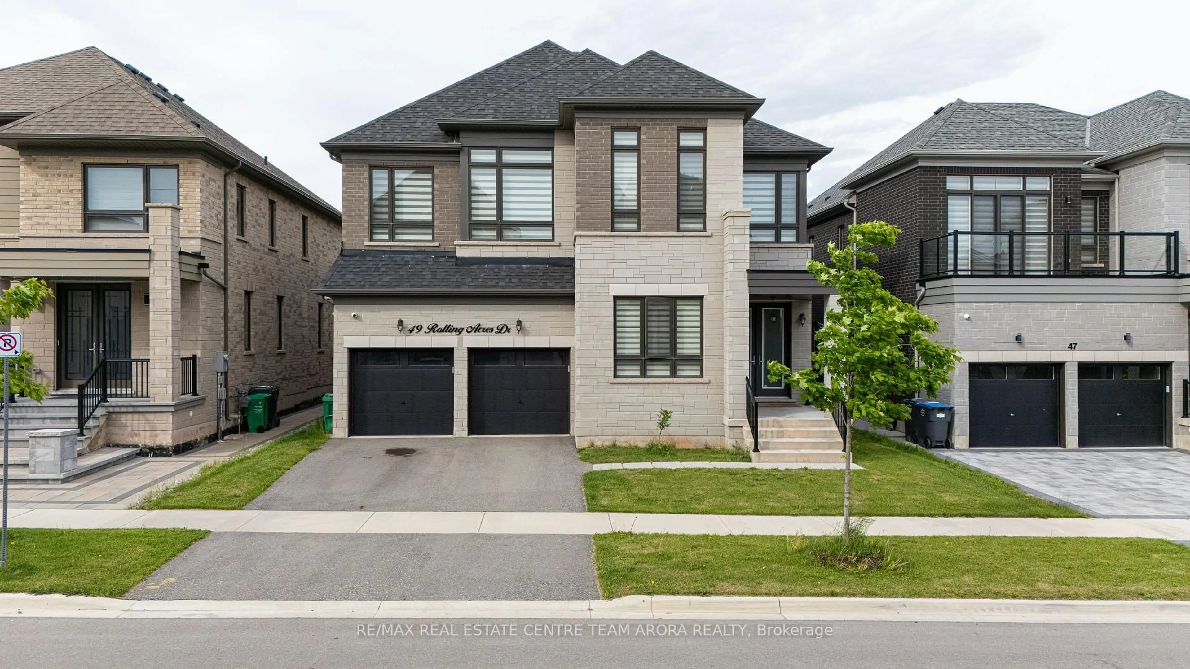 Home with brick exterior material, street for 49 Rolling Acres Dr, Brampton Ontario L6X 5R2