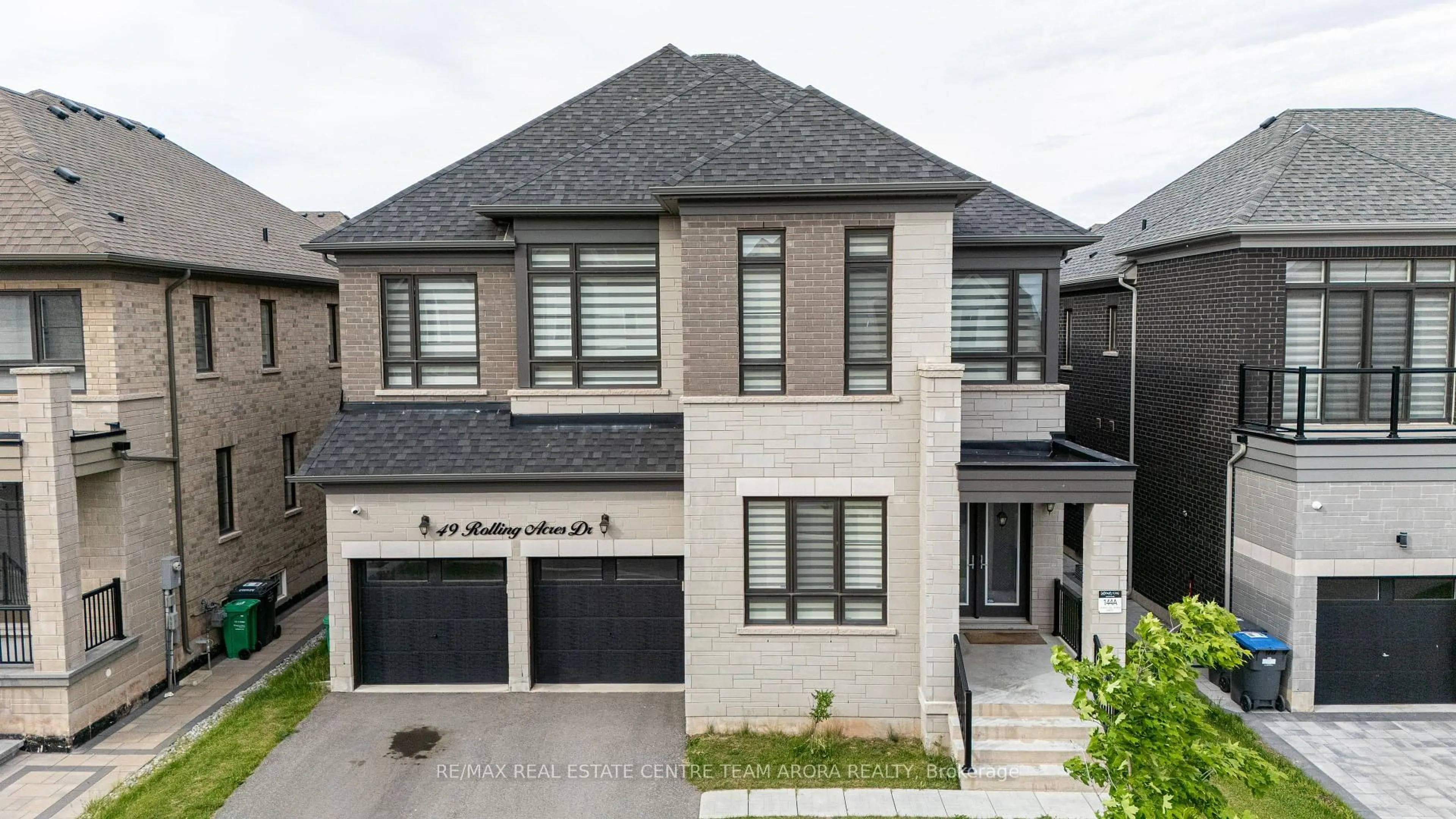 Home with brick exterior material, street for 49 Rolling Acres Dr, Brampton Ontario L6X 5R2