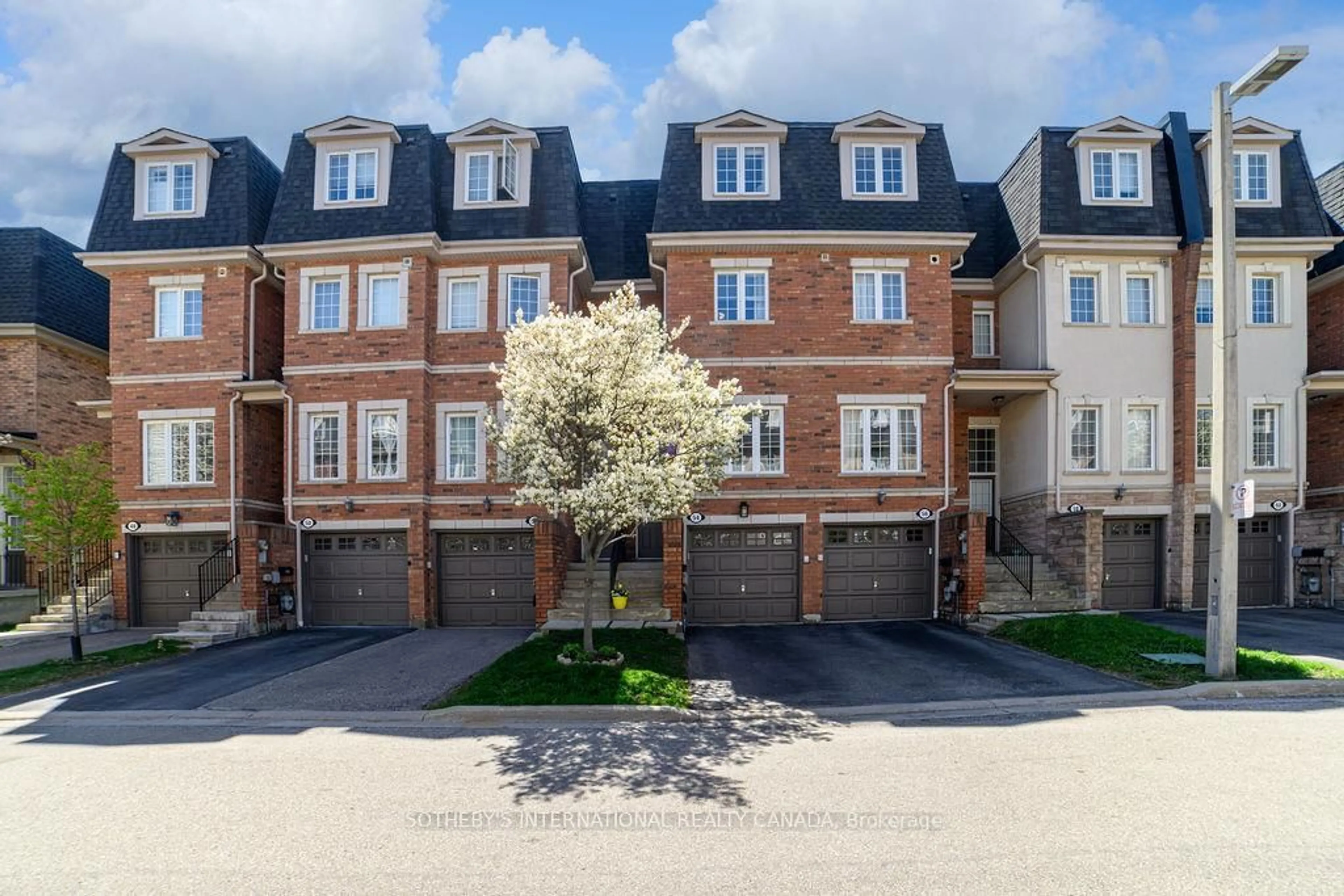 A pic from outside/outdoor area/front of a property/back of a property/a pic from drone, street for 435 Hensall Circ #54, Mississauga Ontario L5A 4P1