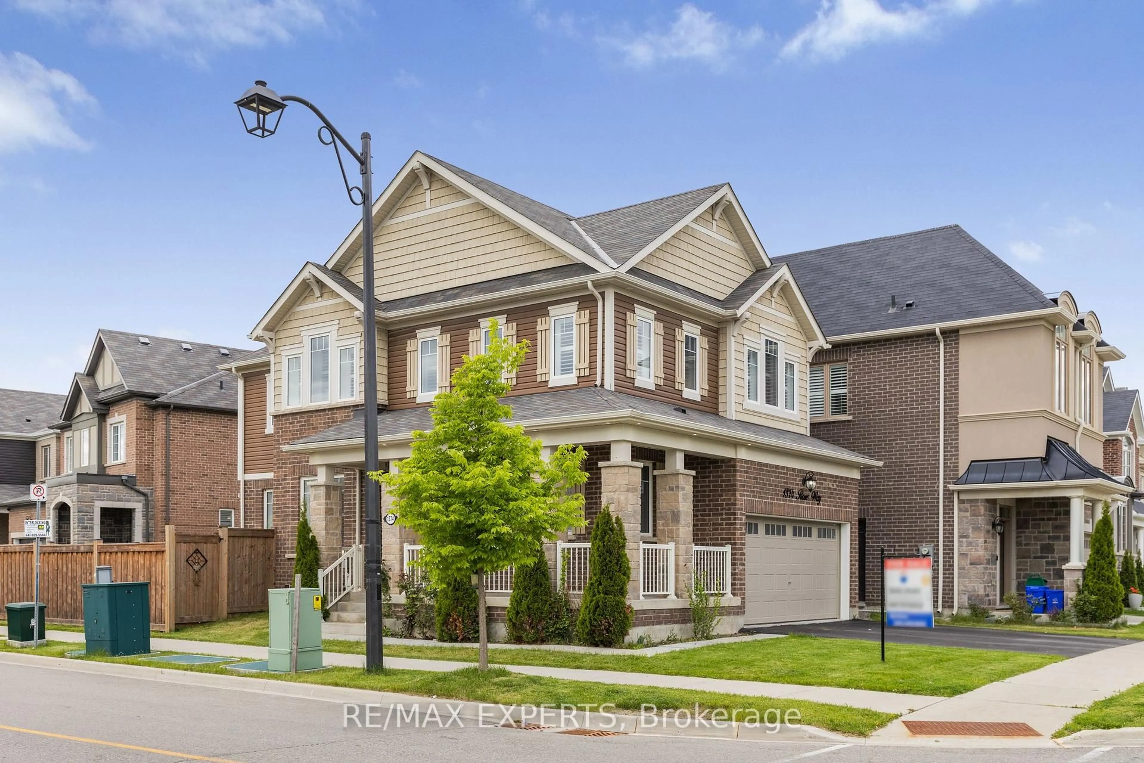 Home with brick exterior material, street for 1374 Rose Way, Milton Ontario L9E 1M7