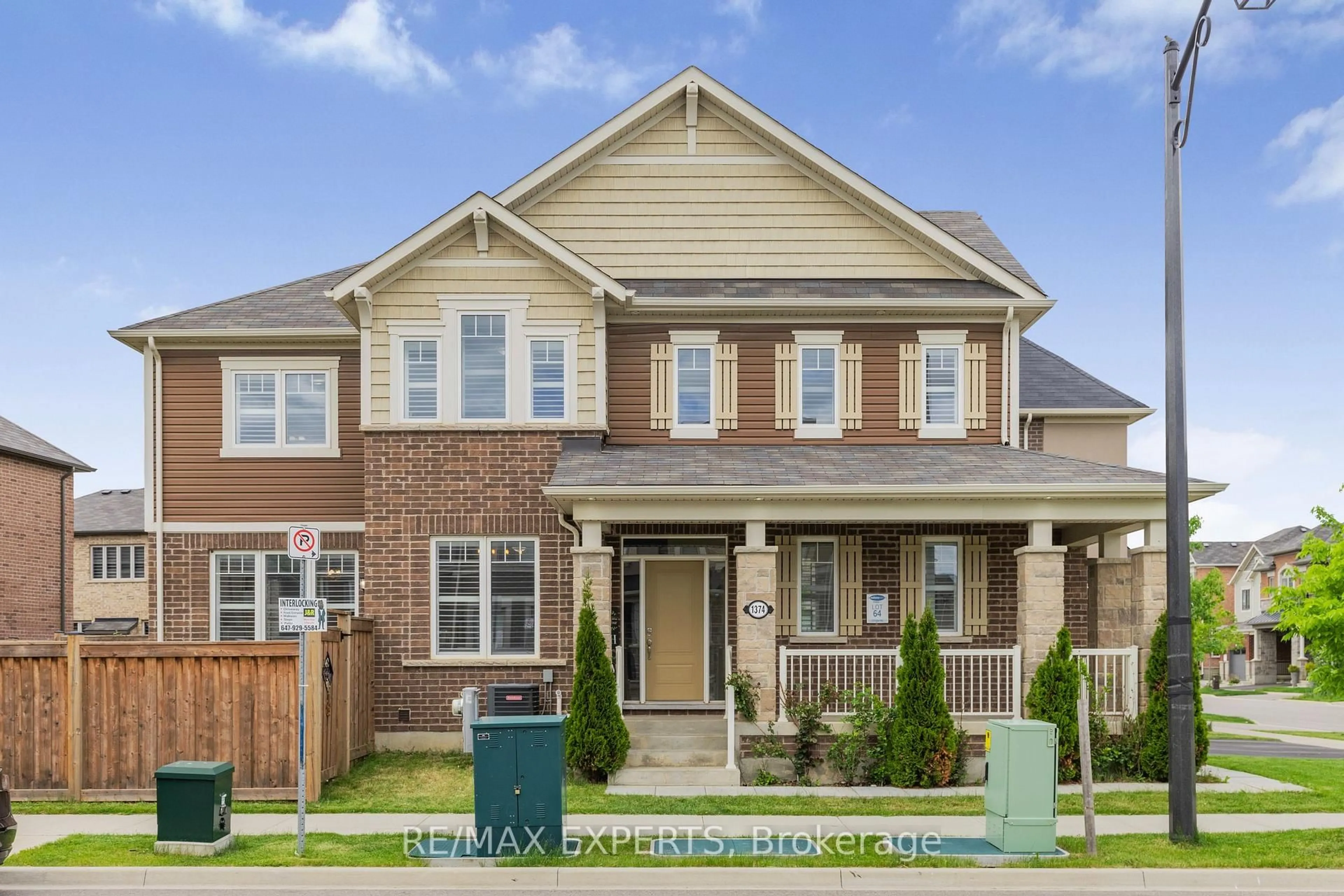 Home with brick exterior material, street for 1374 Rose Way, Milton Ontario L9E 1M7