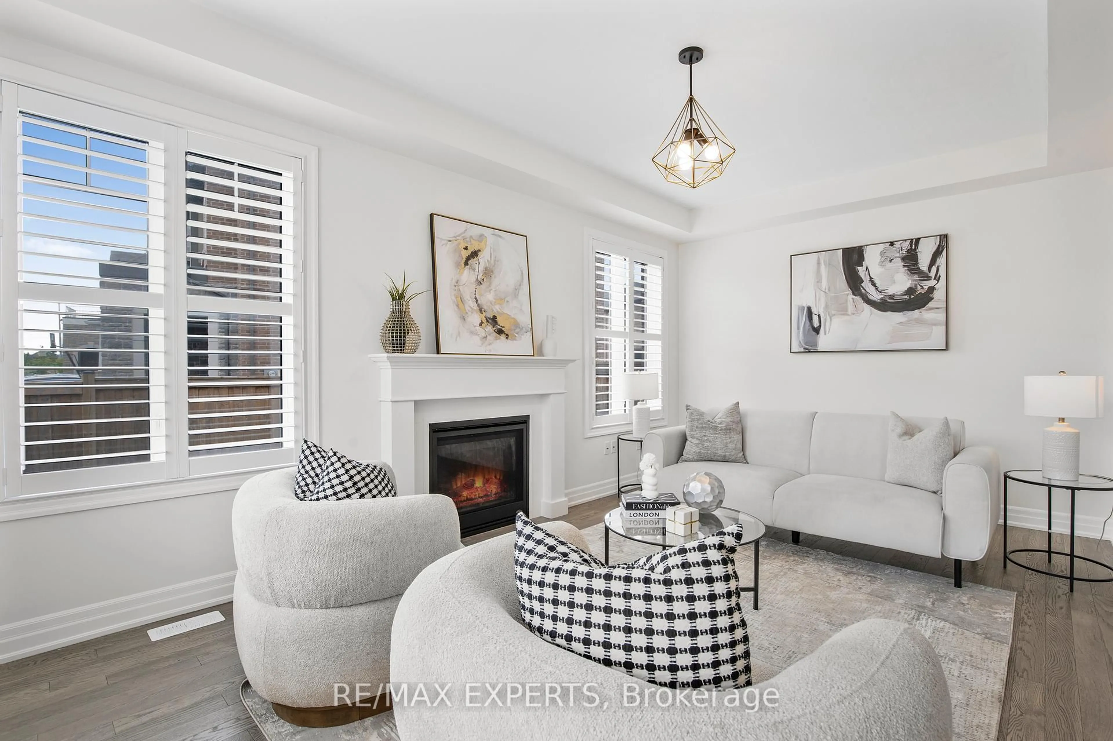 Living room with furniture, unknown for 1374 Rose Way, Milton Ontario L9E 1M7