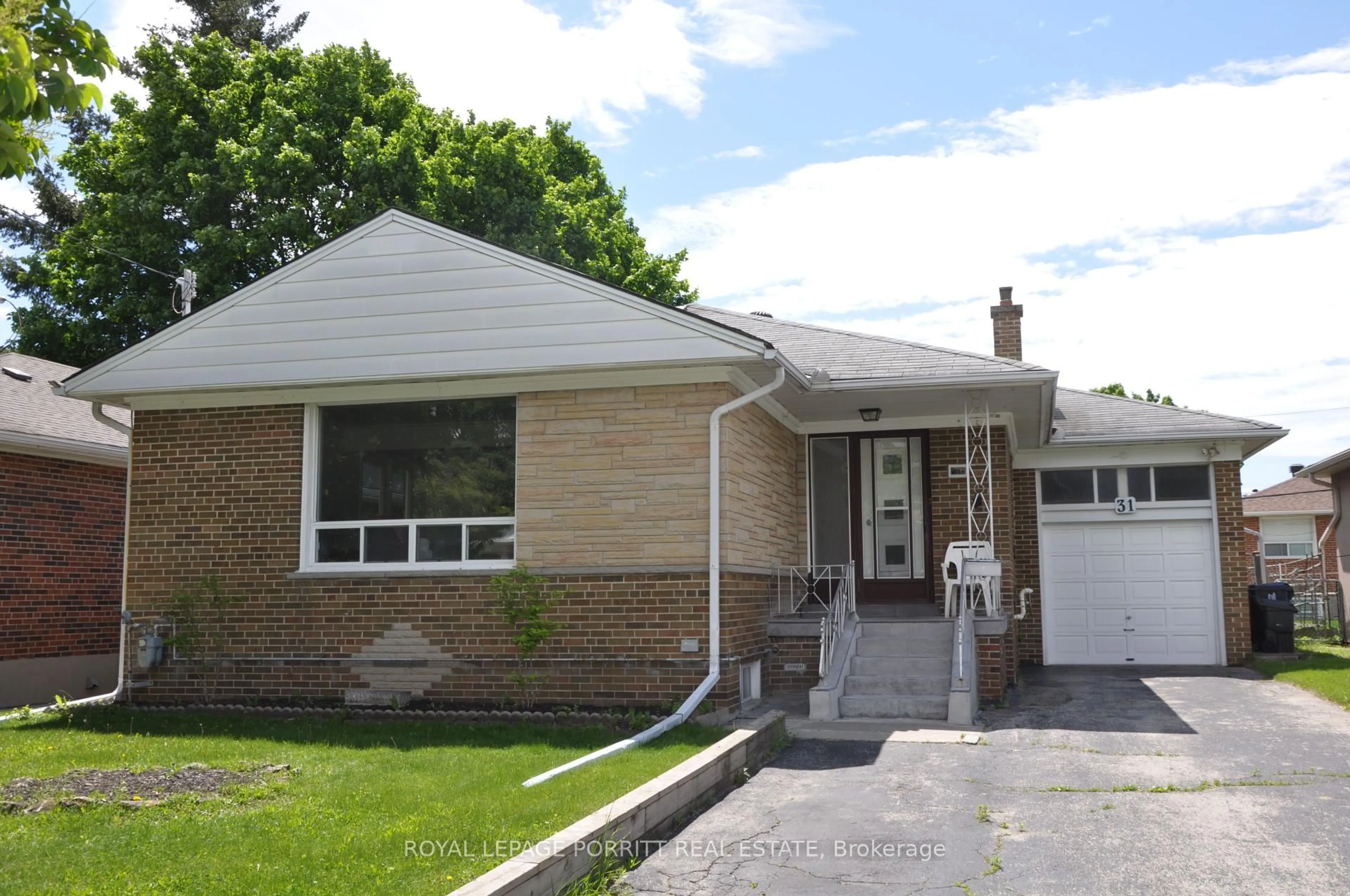 Home with vinyl exterior material, street for 31 Badger Dr, Toronto Ontario M8Z 2M8