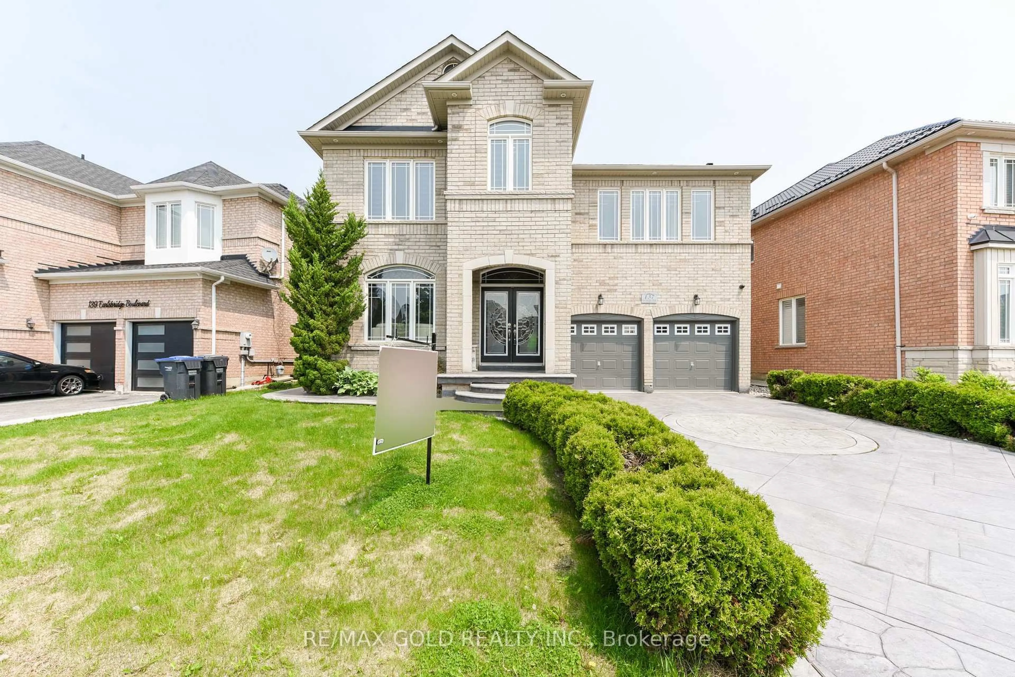 Home with brick exterior material, street for 137 EARLSBRIDGE Blvd, Brampton Ontario L7A 3T7