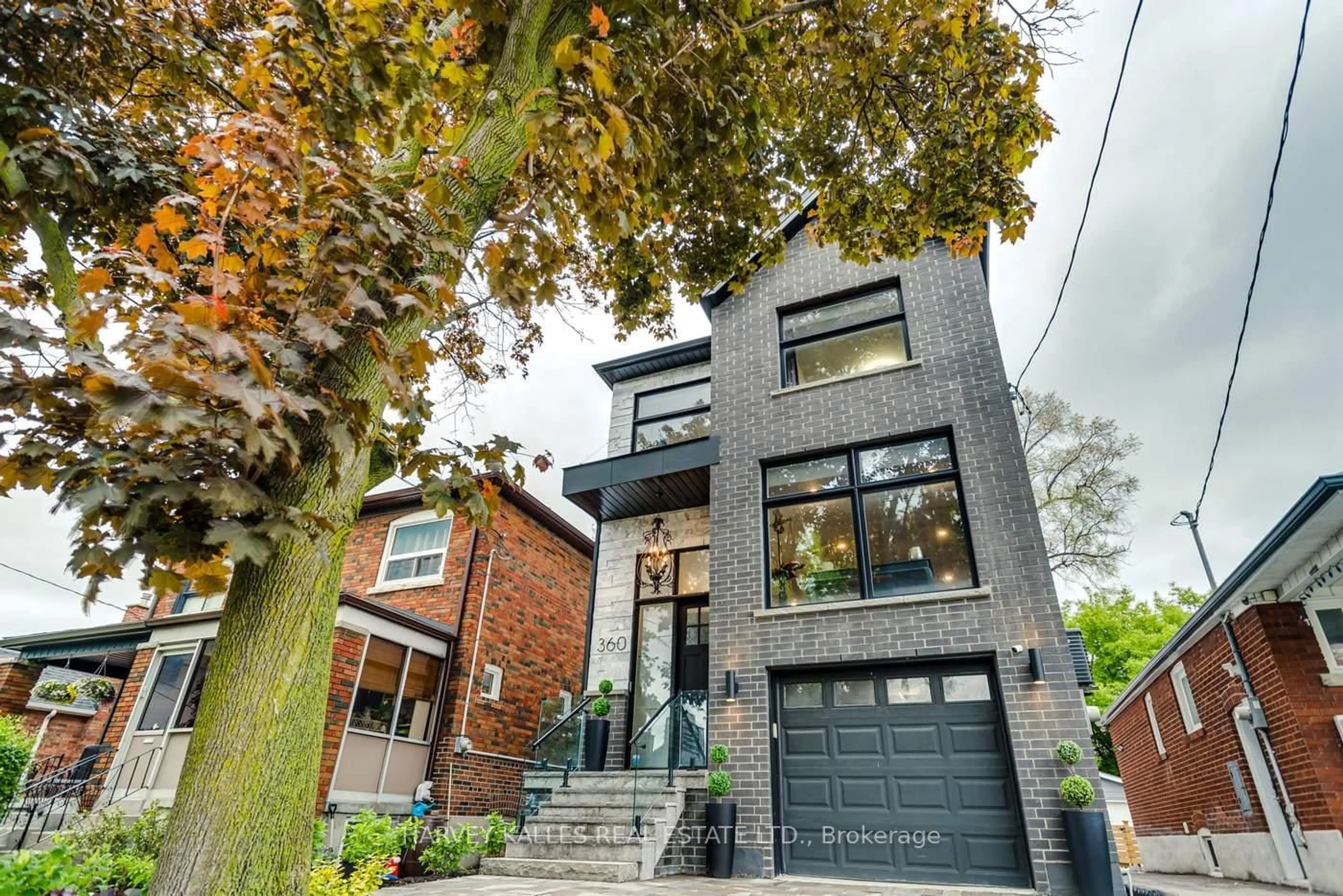 Home with brick exterior material, street for 360 Whitmore Ave, Toronto Ontario M6E 2N4