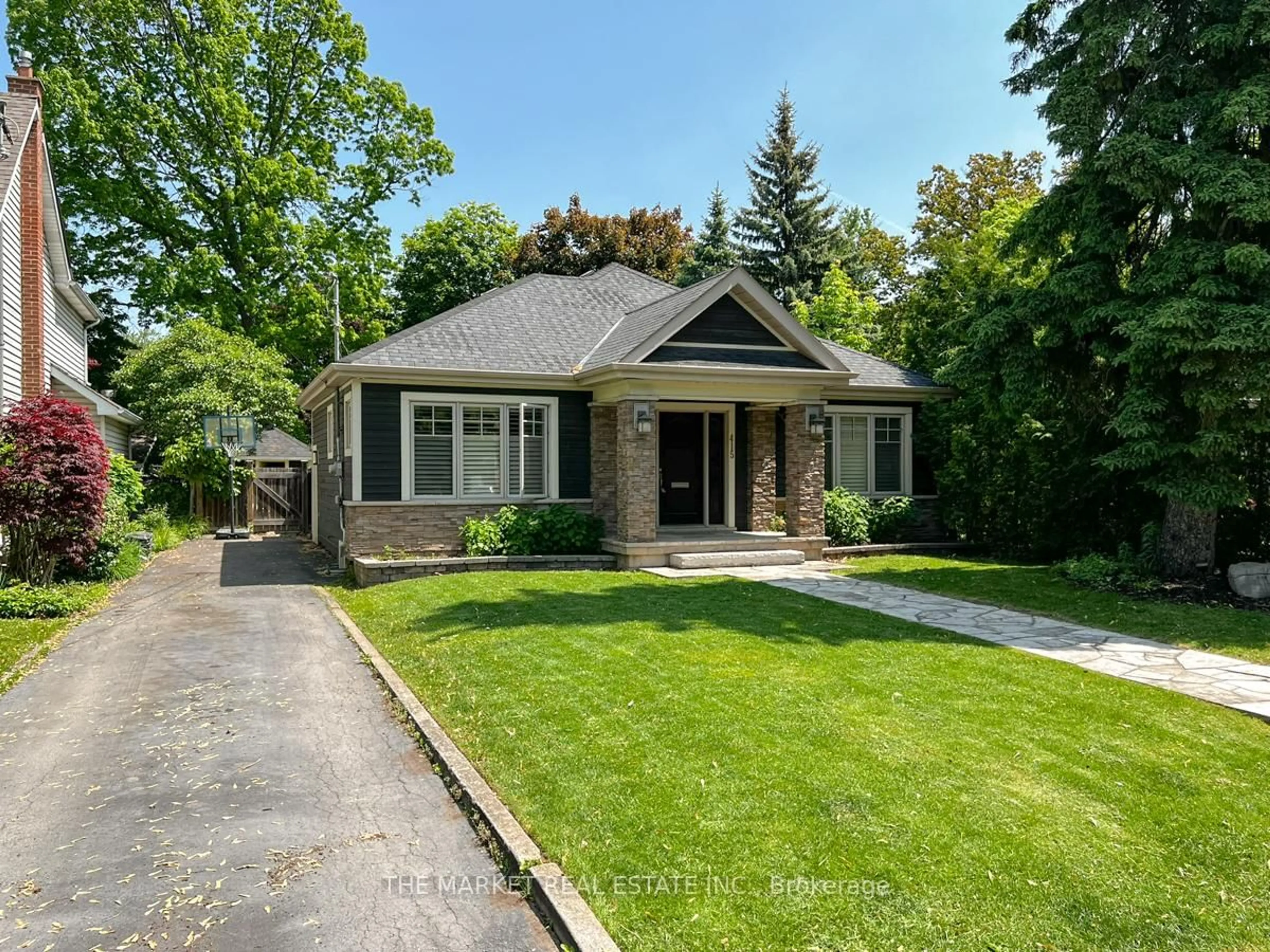 Home with brick exterior material, street for 415 Queen Mary Dr, Oakville Ontario L6K 3M2