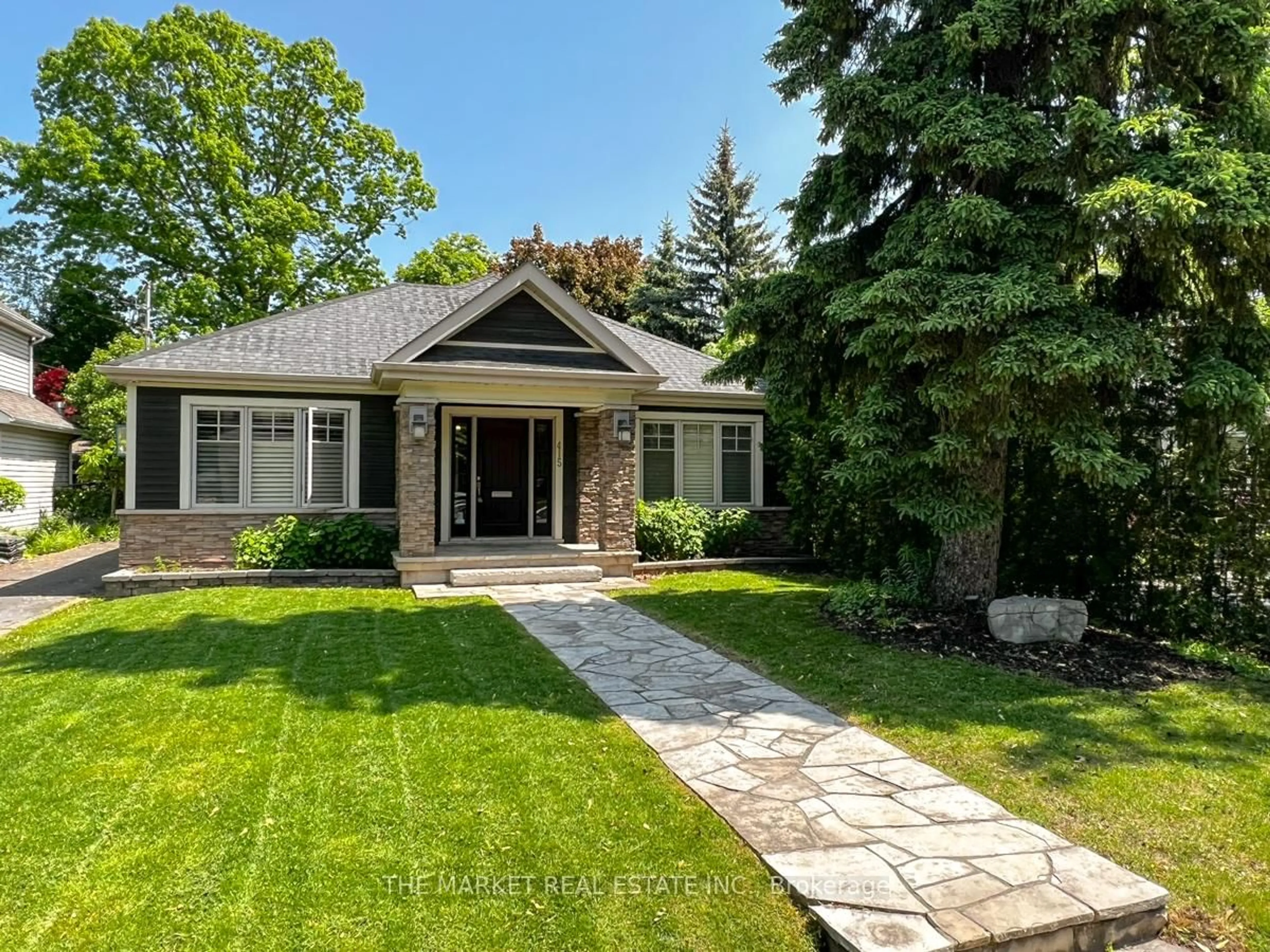 Home with brick exterior material, street for 415 Queen Mary Dr, Oakville Ontario L6K 3M2