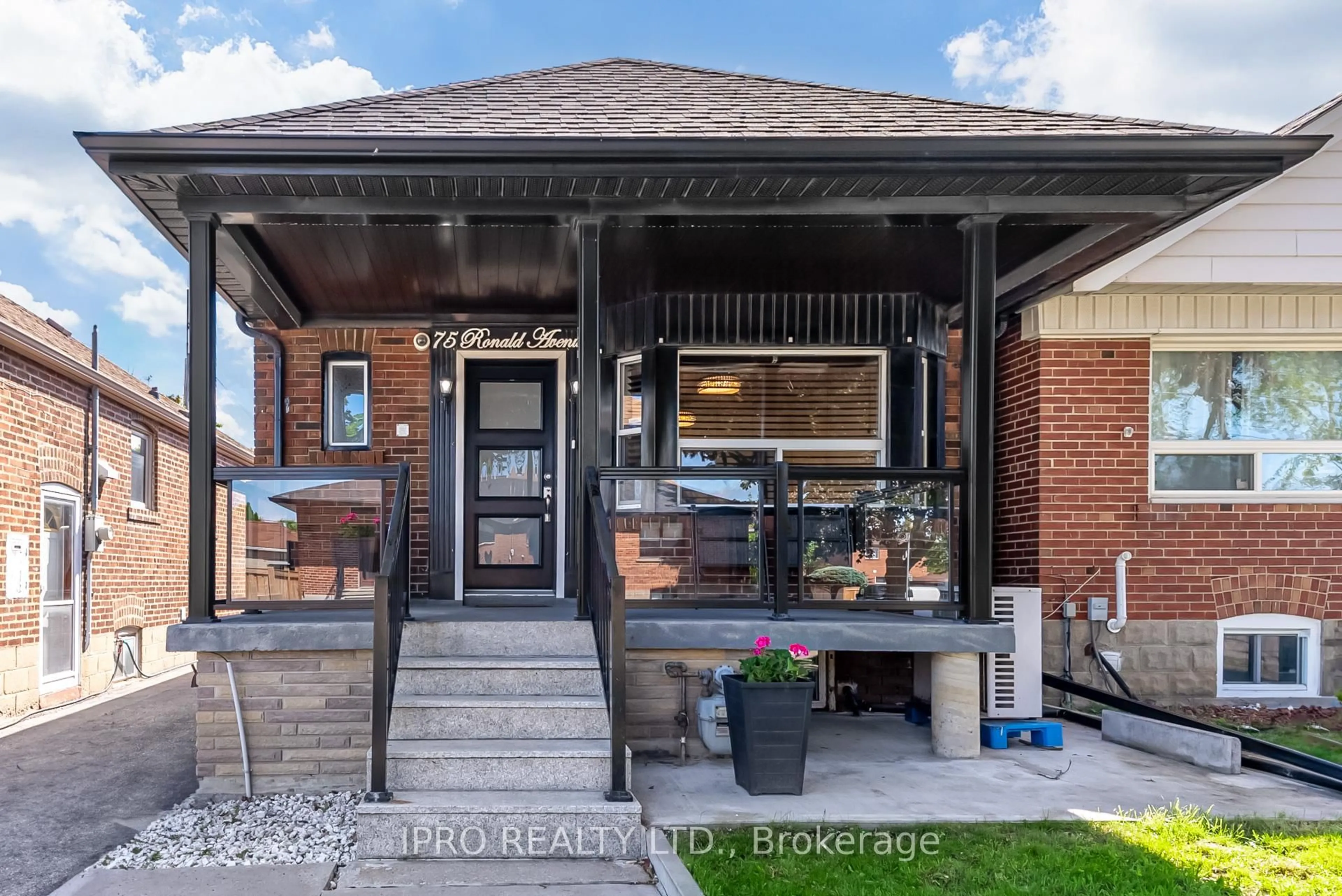 Home with brick exterior material, street for 75 Ronald Ave, Toronto Ontario M6E 4M8