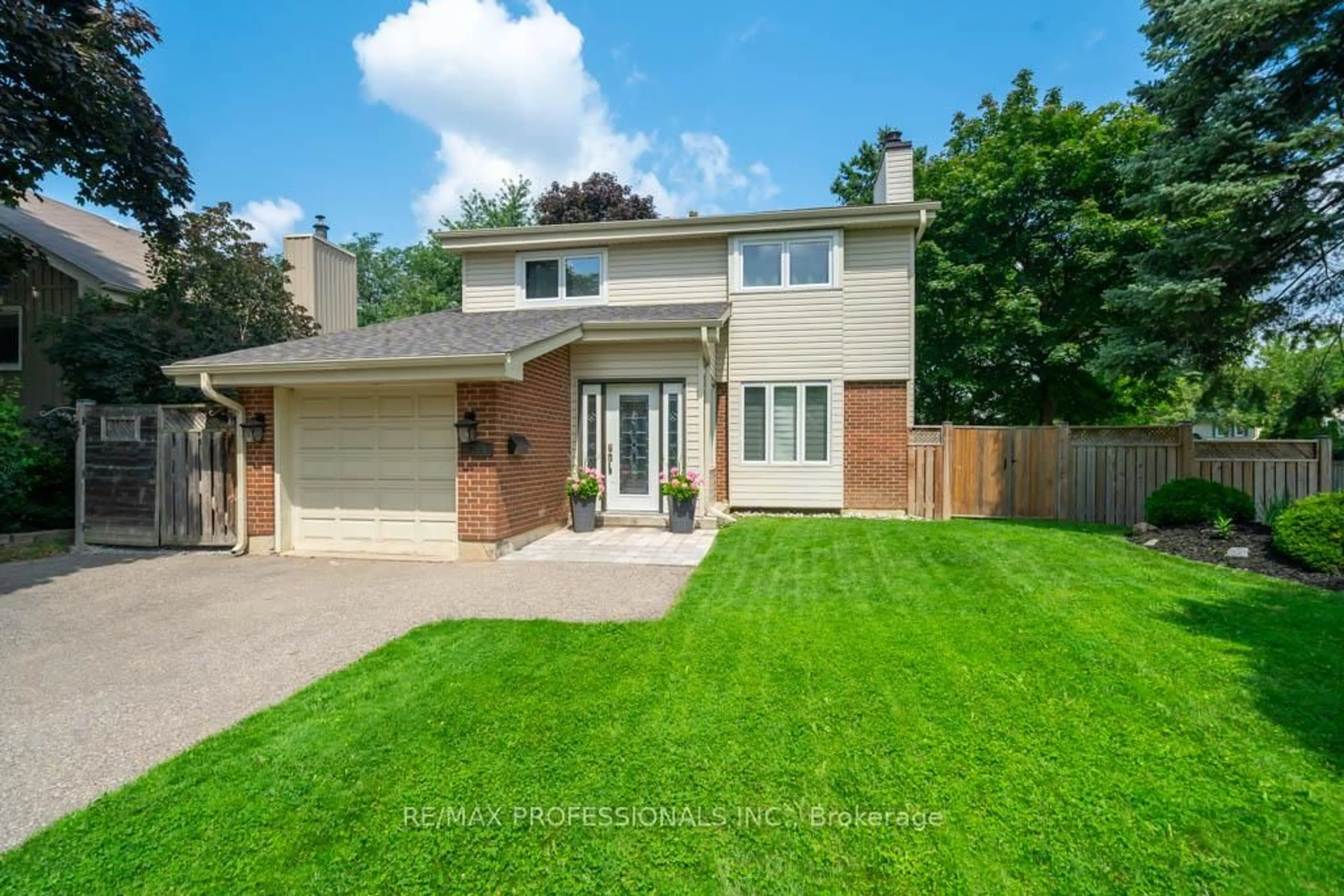 Home with brick exterior material, street for 4199 Gayling Gdns, Mississauga Ontario L5L 1Z8