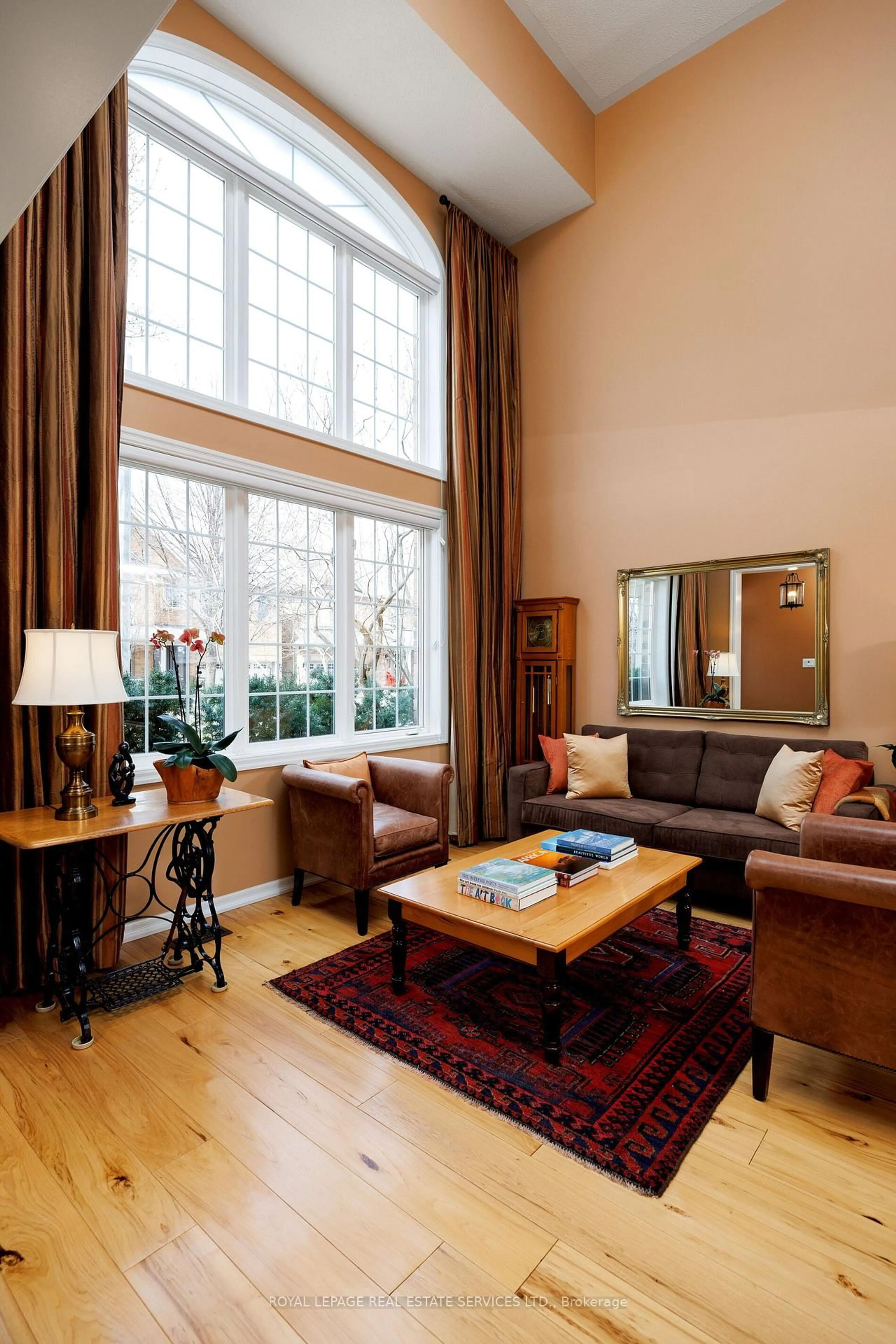 Living room with furniture, wood/laminate floor for 1392 Pinecliff Rd, Oakville Ontario L6M 3Z1