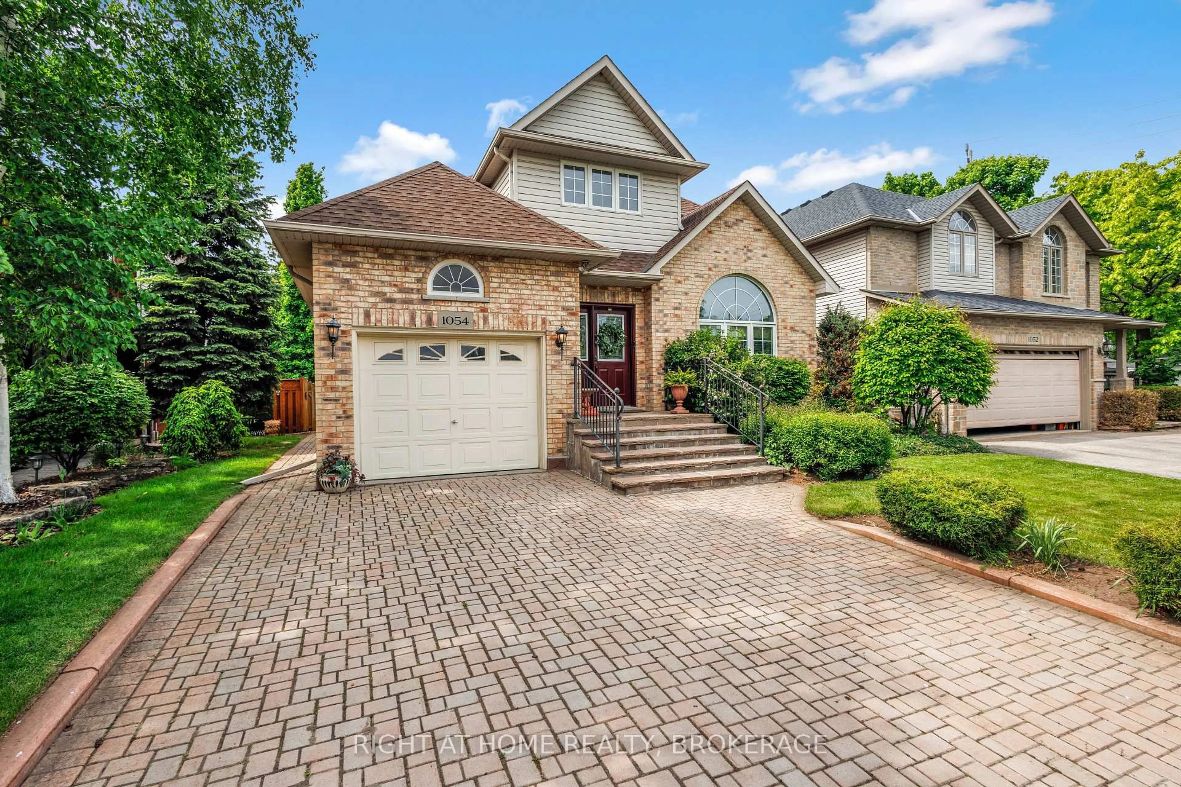 Home with brick exterior material, street for 1054 Augustus Dr, Burlington Ontario L7S 2L1