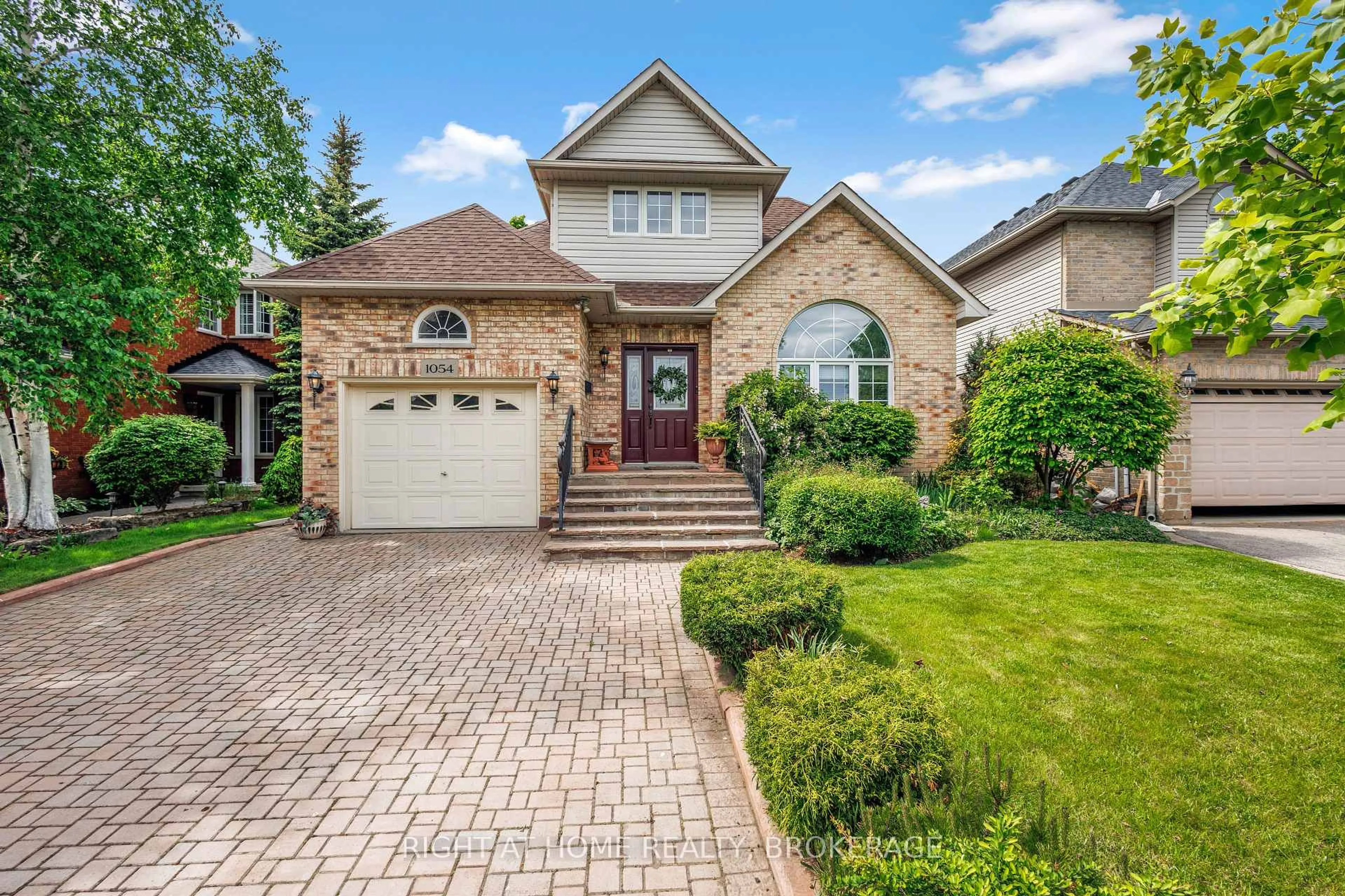 Home with brick exterior material, street for 1054 Augustus Dr, Burlington Ontario L7S 2L1
