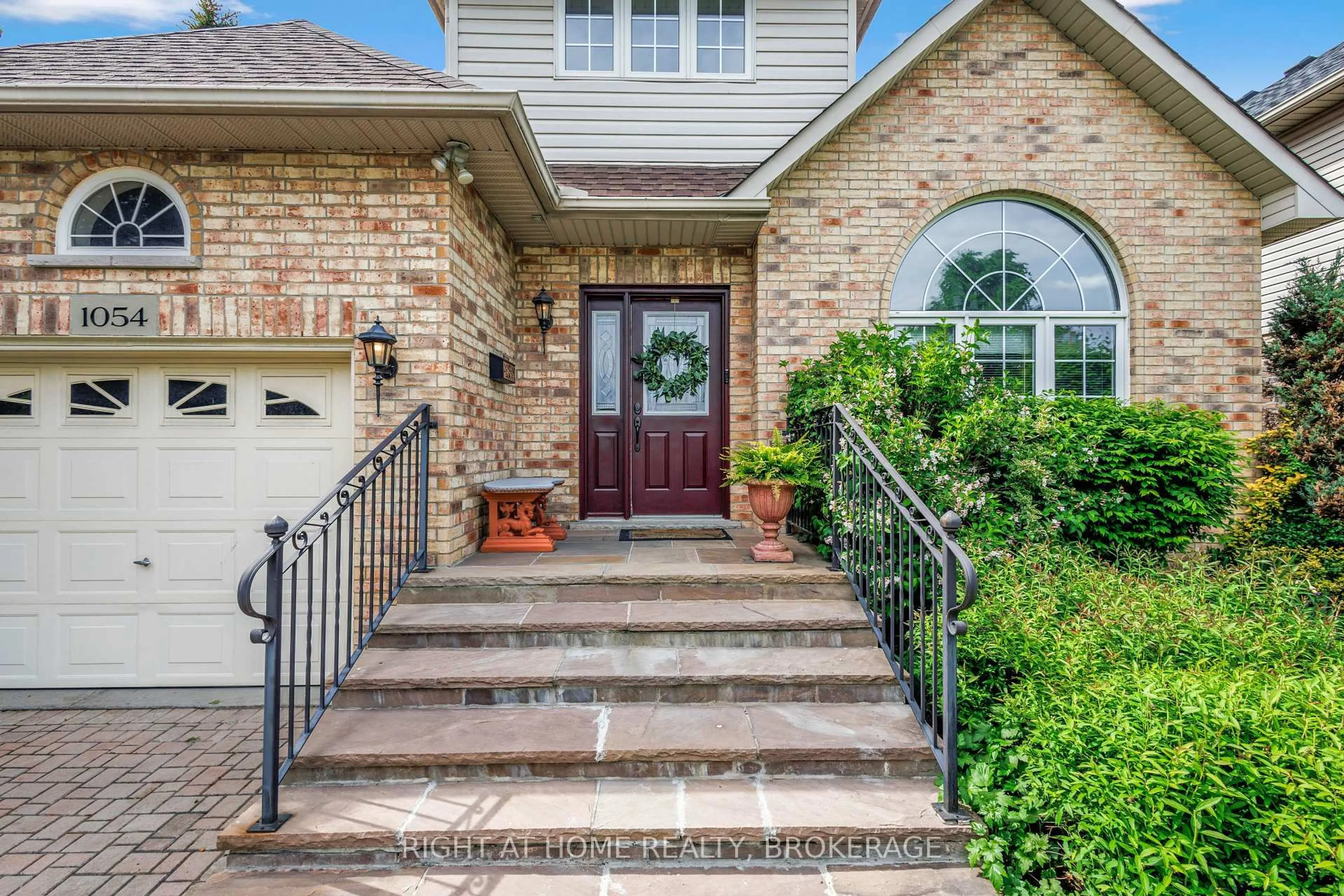 Home with brick exterior material, street for 1054 Augustus Dr, Burlington Ontario L7S 2L1